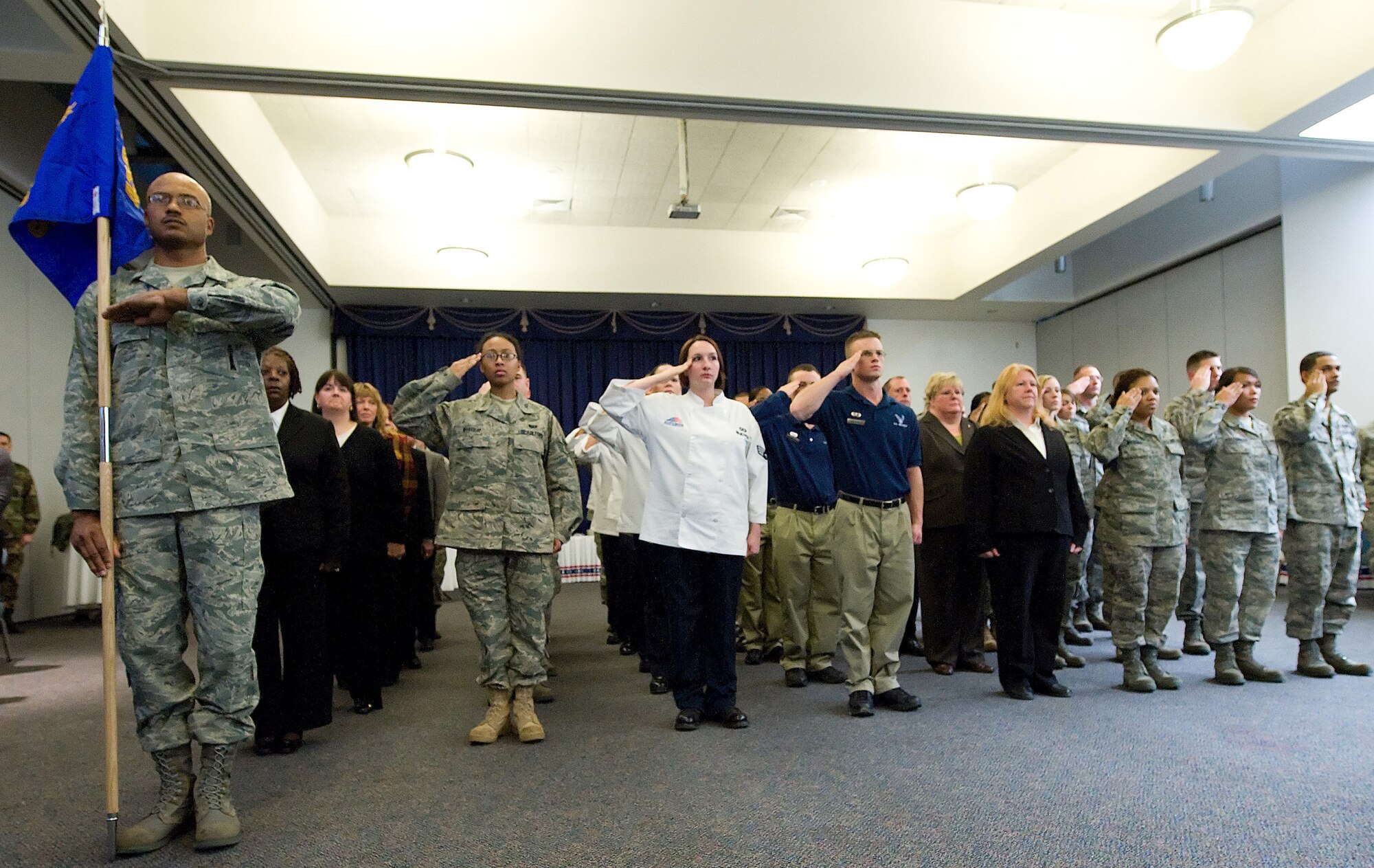 The newly formed 436th Force Support Squadron salute the new 436th FSS commander, Maj. Michael Mullins, Feb. 6 at The Landings Club. (U.S. Air Force photo/ Jason Minto)