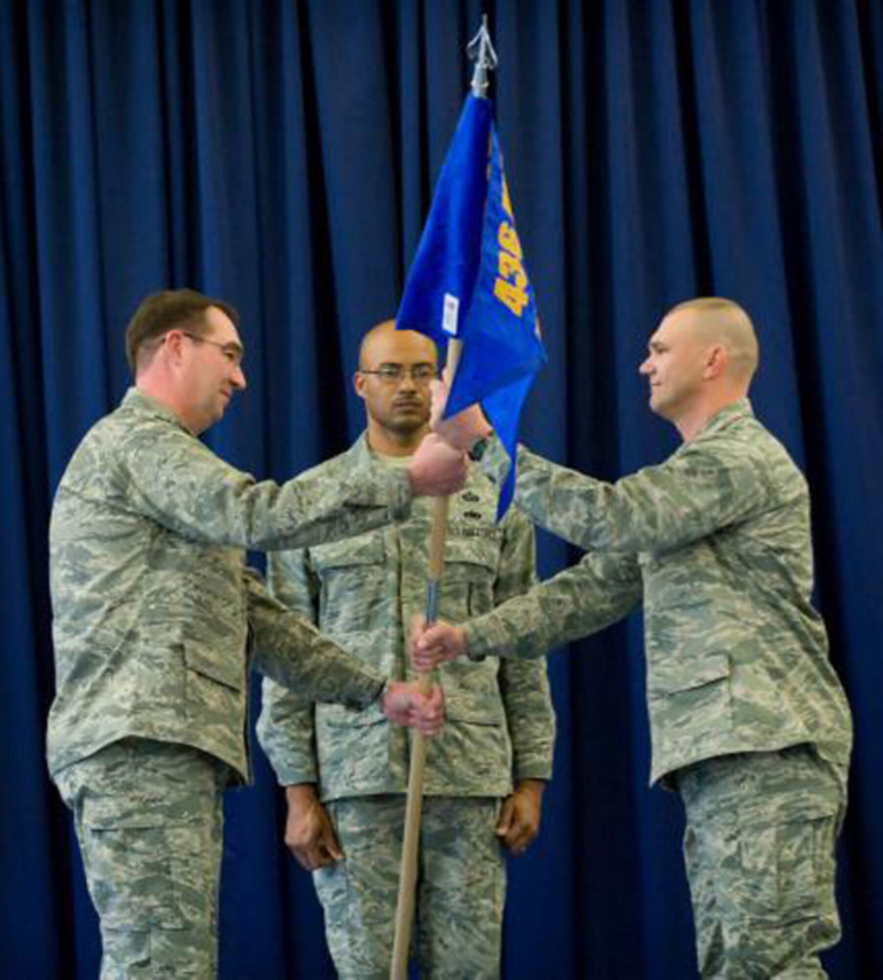 (Left) Col. Todd Emmert, 436th Mission Support Group commander, hands over the 436th Force Support Squadron guidon and command of the 436th FSS to Maj. Michael Mullins, Feb. 6 at The Landings Club. (U.S. Air Force photo/ Jason Minto)