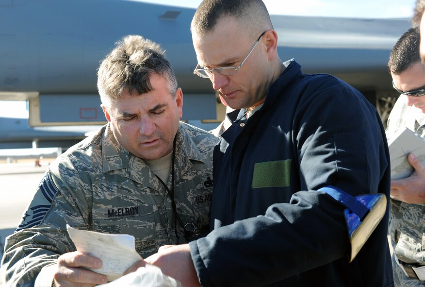 DYESS AIR FORCE BASE, Texas -- 8th Air Force Giant Sword II inspector, Chief Master Sergeant Donald McElroy, reviews and highlights discrepancies while inspecting a power unit for the B-1 here, Feb 9. Part two of the inspection included overseeing pre-flight inspection procedures. (U.S. Air Force photo by Senior Airman Domonique Simmons)