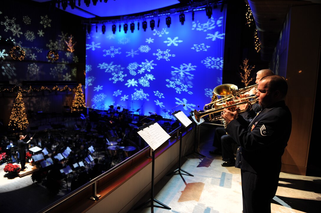 Antiphonal brass players and Concert Band perform the opening sequence 'Christmastime" during the USAF Heartland of America Band's Holiday Show "The Promise of the Season."