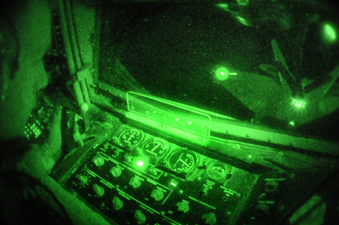 Staff Sgt. Jeremy Welch directs the boom to refuel an aircraft Feb. 3 during a Red Flag exercise at Nellis Air Force Base, Nev.  Red Flag is a multi-national exercise providing a realistic environment to practice combat scenarios.  The experience gained during the exercise is vital to the survival of air crews in combat.  Sergeant Welch is a boom operator with the 905th Air Refueling Squadron at Grand Forks AFB, N.D.  (U.S. Air Force photo/Senior Airman Nadine Y. Barclay)