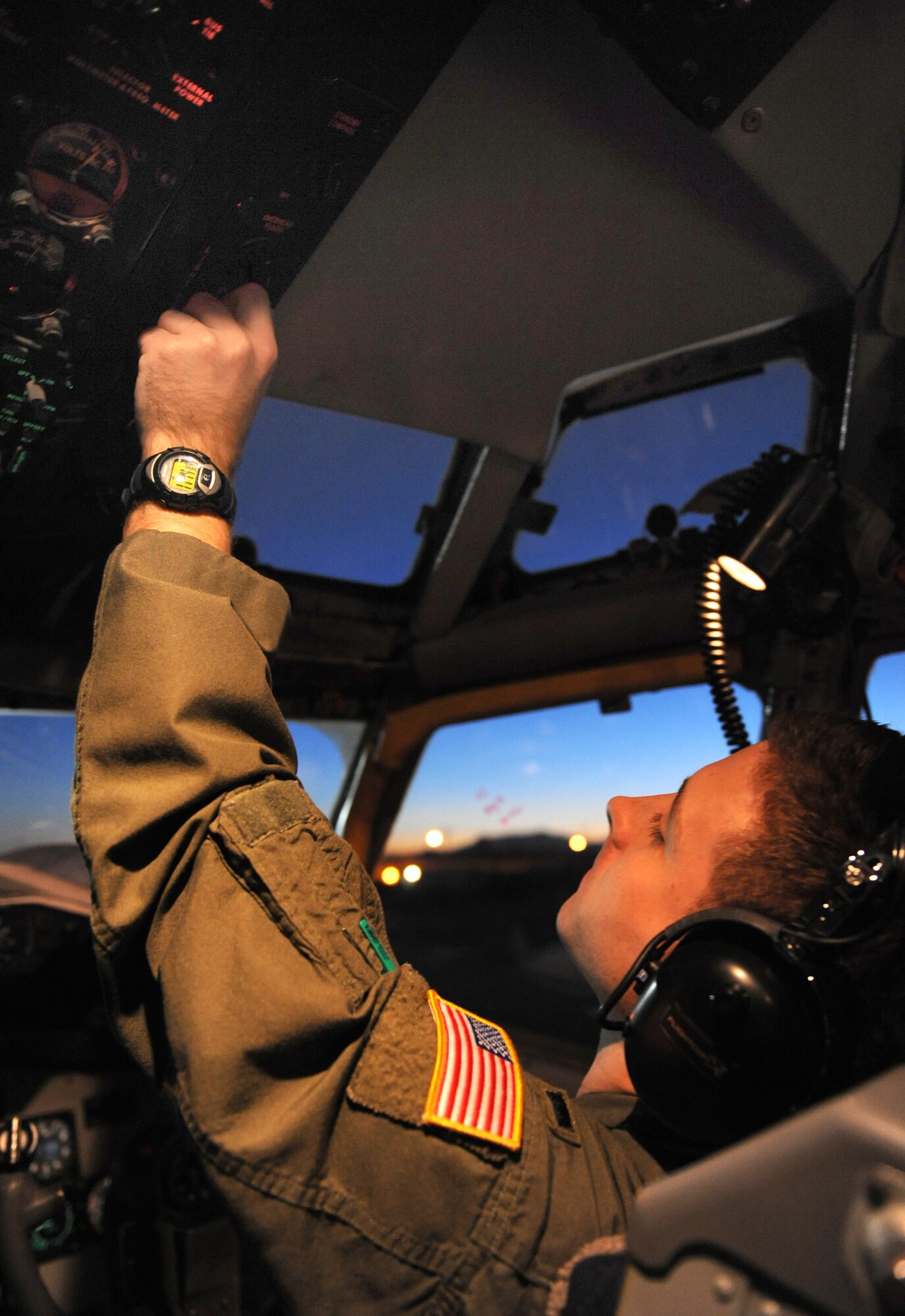 1st Lt. Joshua Rope performs a pre-flight inspection Feb. 3 in the cockpit of a KC-135 Stratotanker during a Red Flag exercise at Nellis Air Force Base, Nev.  Red Flag is a multi-national exercise providing a realistic environment to practice combat scenarios.  The experience gained during the exercise is vital to the survival of air crews in combat.  Lieutenant Rope is a pilot with the 905th Air Refueling Squadron at Grand Forks AFB, N.D. (U.S. Air Force photo/Senior Airman Nadine Y. Barclay)