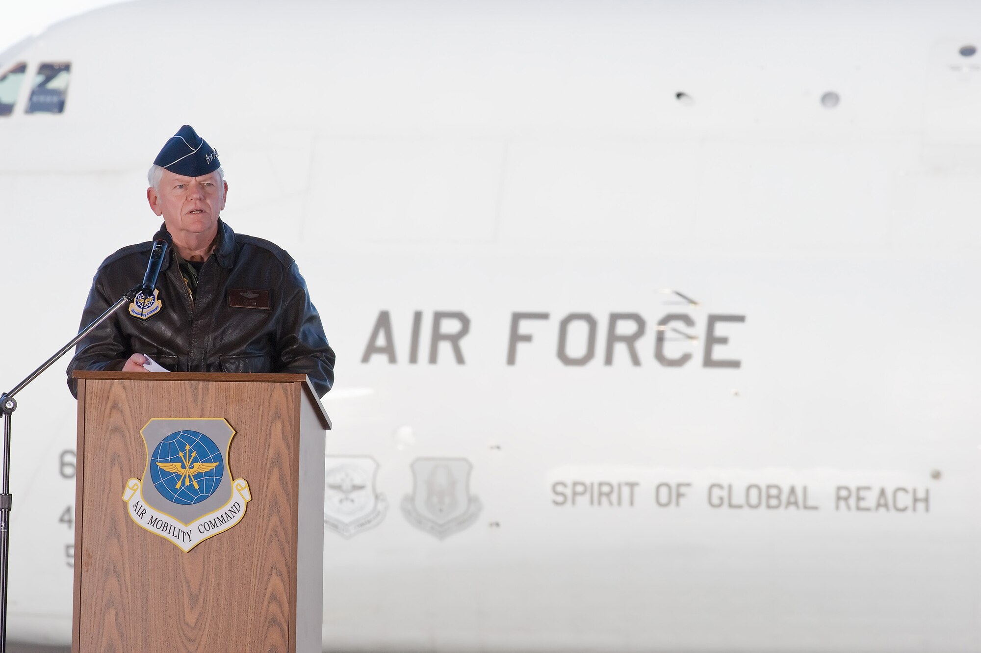 Gen. Arthur Lichte, Air Mobility Command commander, presents Team Dover's first C-5M Super Galaxy, The Spirit of Global Reach, during a ceremony on Dover Air Force Base, Del., Feb. 9. (U.S. Air Force photo/Roland Balik) 
