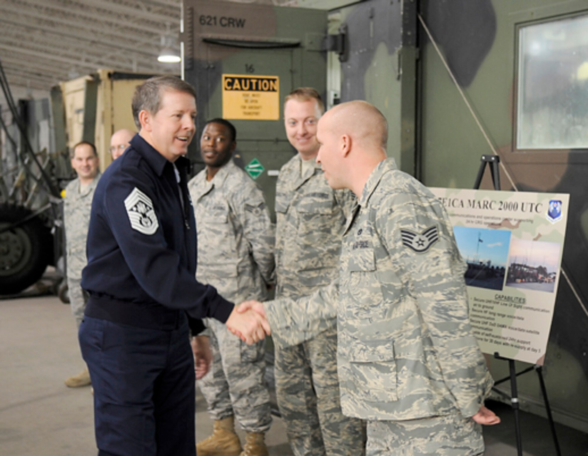 Chief Master Sergeant of The Air Force Rodney J. McKinley meets Airmen at the 621st Contingency Response Wing Warehouse. Airman demonstrated the Mobile Communications and Operations Center, which supports 24- hour contingency response operations. During his stay, Chief McKinley also visited the 305th Air Mobility Wing, Halvorsen Hall Dining Facility, Airman Leadership School, The McGuire Club and the 21st Expeditionary Mobility Task Force. (U.S. Air Force photo/Carlos Cintron)