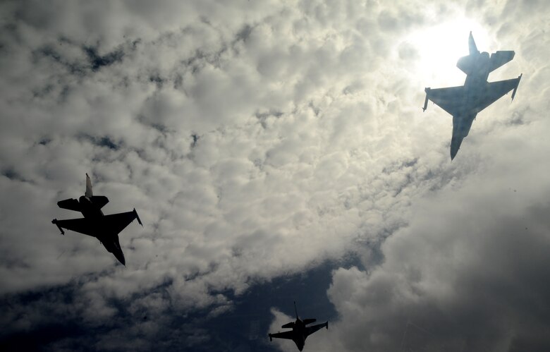A 3-ship of F-16 Fighting Falcons, 18th Aggressor Squadron, Eielson Air Force Base, Alaska, fly in formation over Guam for exercise Cope North 09-1, Feb. 10. Units from the U.S. Air Force, U.S. Navy, and the Japan Air Self Defense Force are participating in exercise Cope North at Andersen AFB, Guam from Feb. 2-13. Cope North 09-1 is the first iteration of a regularly scheduled joint and bilateral exercise and is part of the on-going series of exercises designed to enhance air operations in defense of Japan. 

(U.S. Air Force photo/ Master Sgt. Kevin J. Gruenwald) released





















  












 











































  












 

























