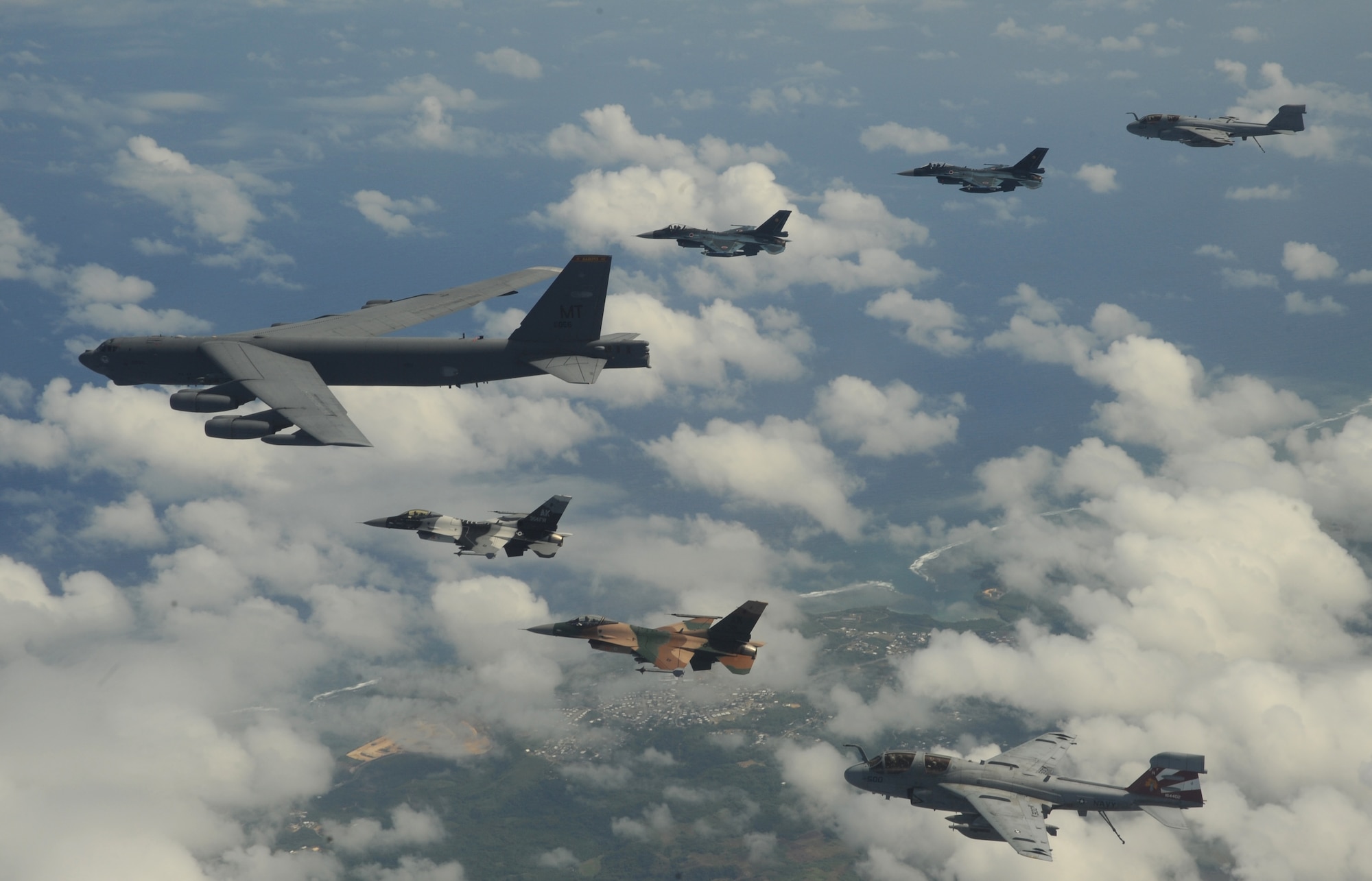 A B-52 Stratofortress currently deployed to Andersen AFB, Guam from the 23rdExpeditionary Bomb Squadron, leads a formation Feb. 10 of Japanese Air Self Defense Force F-2s from the 6th Squadron, Tsuiki Air Base, USAF  F-16 Fighting Falcons from the 18th Aggressor Squadron, Eielson Air Force Base, Alaska, and Navy EA-6B Prowlers from VAQ-136 Carrier Air Wing Five, Atsugi, Japan over Guam during Cope North 09-1 at Andersen Air Force Base, Guam from Feb. 2-13.  Cope North 09-1 is the first iteration of a regularly scheduled joint and bilateral exercise and is part of the on-going series of exercises designed to enhance air operations in defense of Japan. (U.S. Air Force photo/ Master Sgt. Kevin J. Gruenwald) released      