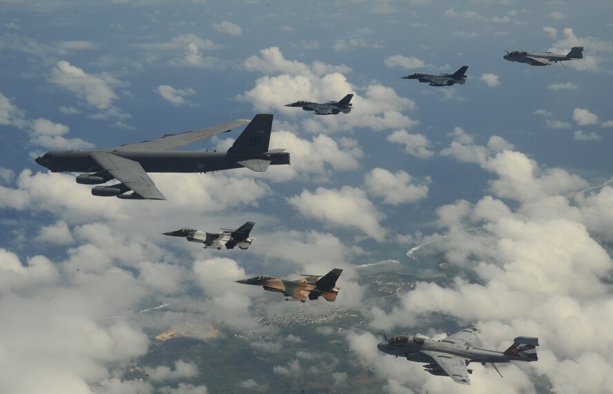 A B-52 Stratofortress currently deployed to Andersen AFB, Guam from the 23rdExpeditionary Bomb Squadron, leads a formation Feb. 10 of Japanese Air Self Defense Force F-2s from the 6th Squadron, Tsuiki Air Base, USAF  F-16 Fighting Falcons from the 18th Aggressor Squadron, Eielson Air Force Base, Alaska, and Navy EA-6B Prowlers from VAQ-136 Carrier Air Wing Five, Atsugi, Japan over Guam during Cope North 09-1 at Andersen Air Force Base, Guam from Feb. 2-13.  Cope North 09-1 is the first iteration of a regularly scheduled joint and bilateral exercise and is part of the on-going series of exercises designed to enhance air operations in defense of Japan. (U.S. Air Force photo/ Master Sgt. Kevin J. Gruenwald) released      