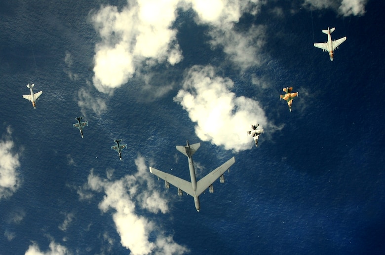 A B-52 Stratofortress currently deployed to Andersen AFB, Guam from the 23rd
Expeditionary Bomb Squadron, leads a formation Feb. 10 of Japanese Air Self Defense Force F-2s from the 6th Squadron, Tsuiki Air Base, USAF  F-16 Fighting Falcons from the 18th Aggressor Squadron, Eielson Air Force Base, Alaska, and Navy EA-6B Prowlers from VAQ-136 Carrier Air Wing Five, Atsugi, Japan over Guam during Cope North 09-1 at Andersen Air Force Base from Feb. 2-13 The Cope North exercise is one of the longest-running series of exercises in the Pacific theater.  Since the first Cope North exercise in 1978, thousands of American and Japanese personnel have honed skills that are vital to maintaining a high level of readiness. This will be the tenth time the United States and Japan have held a Cope North exercise on Guam, and it will be the fourth time that the JASDF will use live ordnance.

(U.S. Air Force photo/ Master Sgt. Kevin J. Gruenwald) released





















  












 











































  












 

























