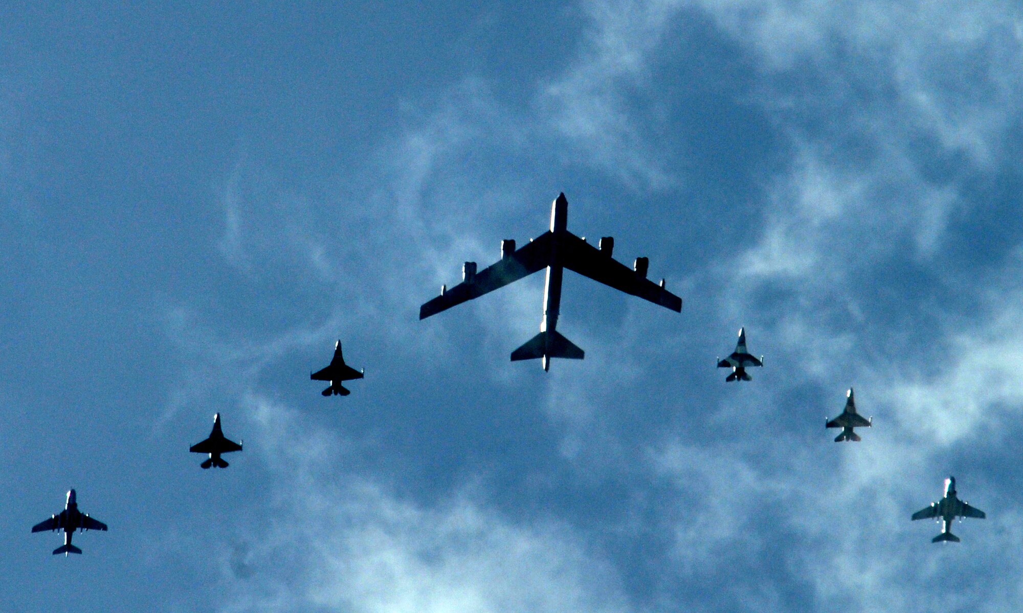A B-52 Stratofortress leads two Japan Air Self Defense Force F-2s, two Navy EA-6Bs, and two F-16 Fighting Falcon Aggressors, in a fomration flight over Guam during Cope North 09-1 Feb. 10.  Cope North is an annual bilateral exercise between U.S. and Japanese forces held at Andersen Air Force Base, Guam, designed to increase interoperability between the two forces in defense of Japan. (U.S. Air Force photo by Senior Airman Ryan Whitney)