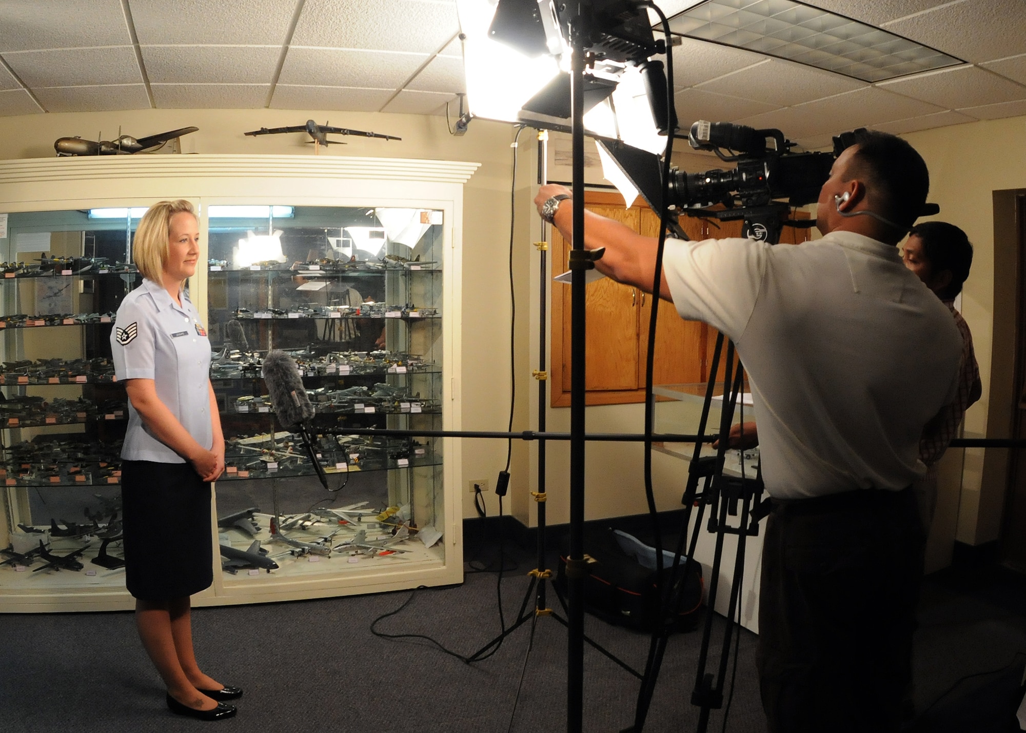 ANDERSEN AIR FORCE BASE, Guam – Guam Military News Network co-host Staff Sgt. Jamie Lessard represents Team Andersen during the filming of the network's first episode at Andersen's history museum Feb 11. In addition to Andersen and Naval Base Guam teaming up on the news network, locally published Navy and Air Force newspapers, The Pacific Navigator and The Pacific Edge, respectively, have combined to create the Joint Region Edge. (U.S. Air Force photo by Senior Airman Nichelle Griffiths)
