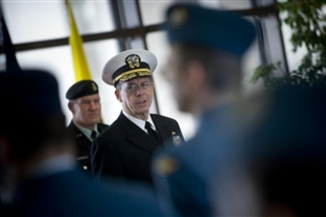 U.S. Navy Adm. Mike Mullen, chairman of the Joint Chiefs of Staff, thanks Canadian service members for their service during a visit  to Ottawa, Canada for counterpart visits, Feb. 10, 2009.  









