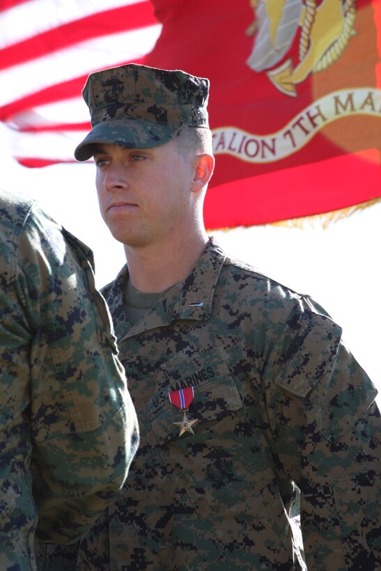 1st Lt. Jon Wilkins, the executive officer of Weapons Company, 2nd Battalion, 7th Marine Regiment, stands proudly after receiving his Bronze Star Medal at a ceremony at Lance Cpl. Torrey L. Gray Field, Feb. 12.