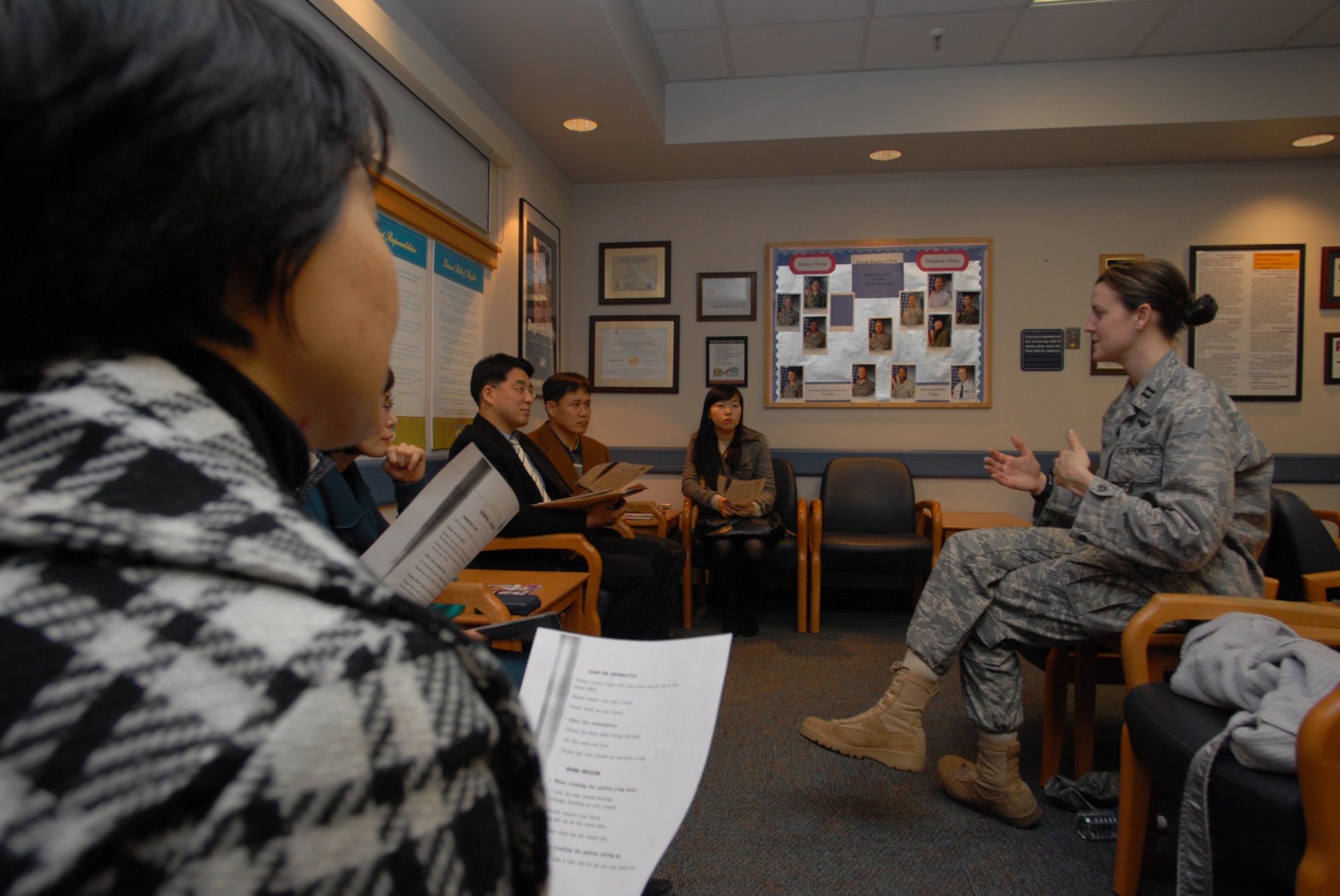 Captain Jennifer Cowie, 8th Medical Group, teaches English to the medical staff of Jesus hospital at the 8th MDG clinic at Kunsan Air Base, Republic of Korea, Feb. 12, 2009. The 8th MDG recently signed a Memorandum of Understanding with Jesus hospital in Jeonju, ROK, to take Wolf Pack members there for care. (US Air Force Photo By Senior Airman Angela Ruiz)
 