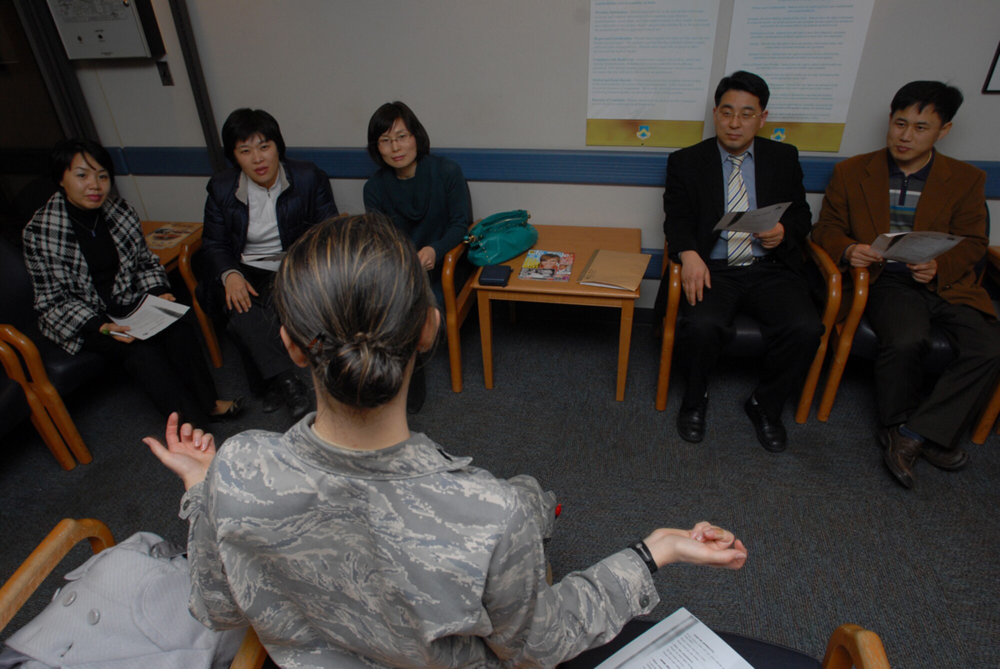 Captain Jennifer Cowie, 8th Medical Group, teaches English to the medical staff of Jesus hospital at the 8th MDG clinic at Kunsan Air Base, Republic of Korea, Feb. 12, 2009. The 8th MDG recently signed a Memorandum of Understanding with Jesus hospital in Jeonju, ROK, to take Wolf Pack members there for care. (US Air Force Photo By Senior Airman Angela Ruiz)
 