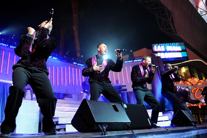 Tops in Blue performs before a large crowd at the Fremont Street Experience, Las Vegas, Nev., Feb. 11. Tops in Blue is an all-active duty U.S. Air Force special unit made up of talented amateur performers who perform for military personnel and their families throughout the world.(U.S. Air Force Photo/Senior Airman Larry E. Reid Jr.)