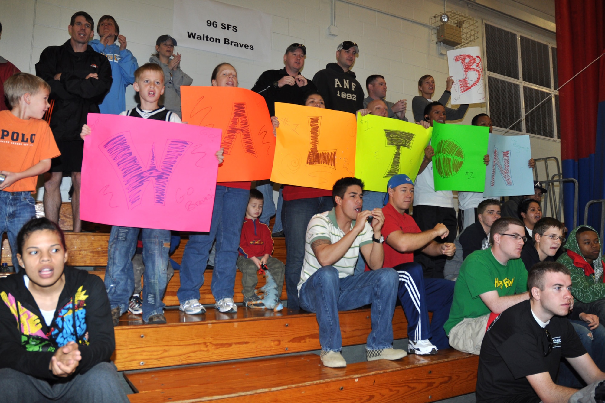 Airmen from the 96th Security Forces Squadron root for the Fort Walton High School Braves Special Olympics basketball team Feb. 6, during the 2009 Northwest Sectional basketball tournament here. More than 125 athletes on 17 teams from seven counties throughout Northwest Florida participated in the event. (U.S. Air Force photo/ Airman Anthony Jennings)