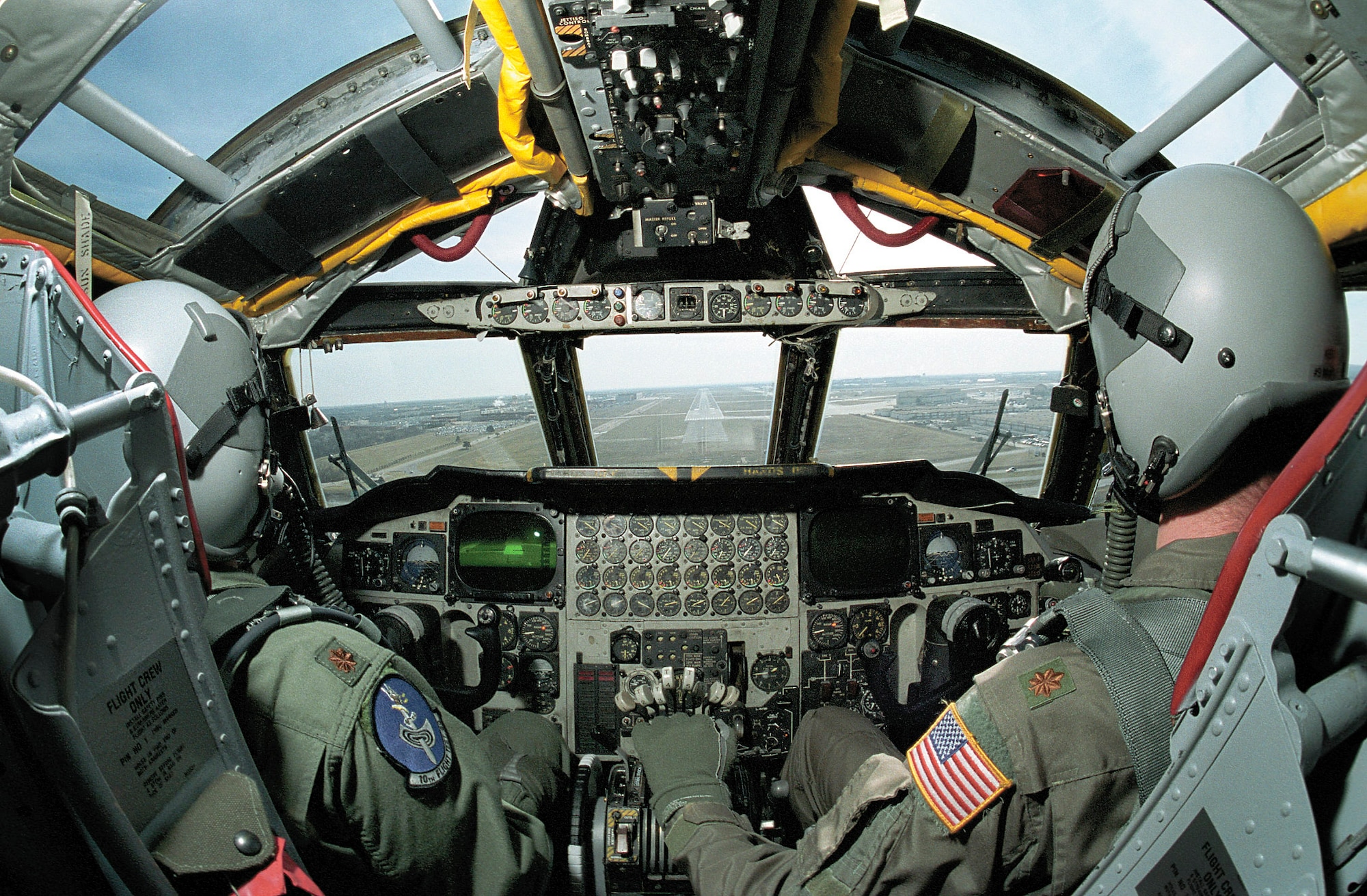 Maj. Tim Hines (left) and Maj. Cary Montgomery, 10th Flight Test Squadron pilots, bring a B-52 Stratofortress to Tinker Air Force Base, Okla., for depot maintenance.  The crew will then fly the aircraft back to its home station after any work is done. (U.S. Air Force photo/Margo Wright)