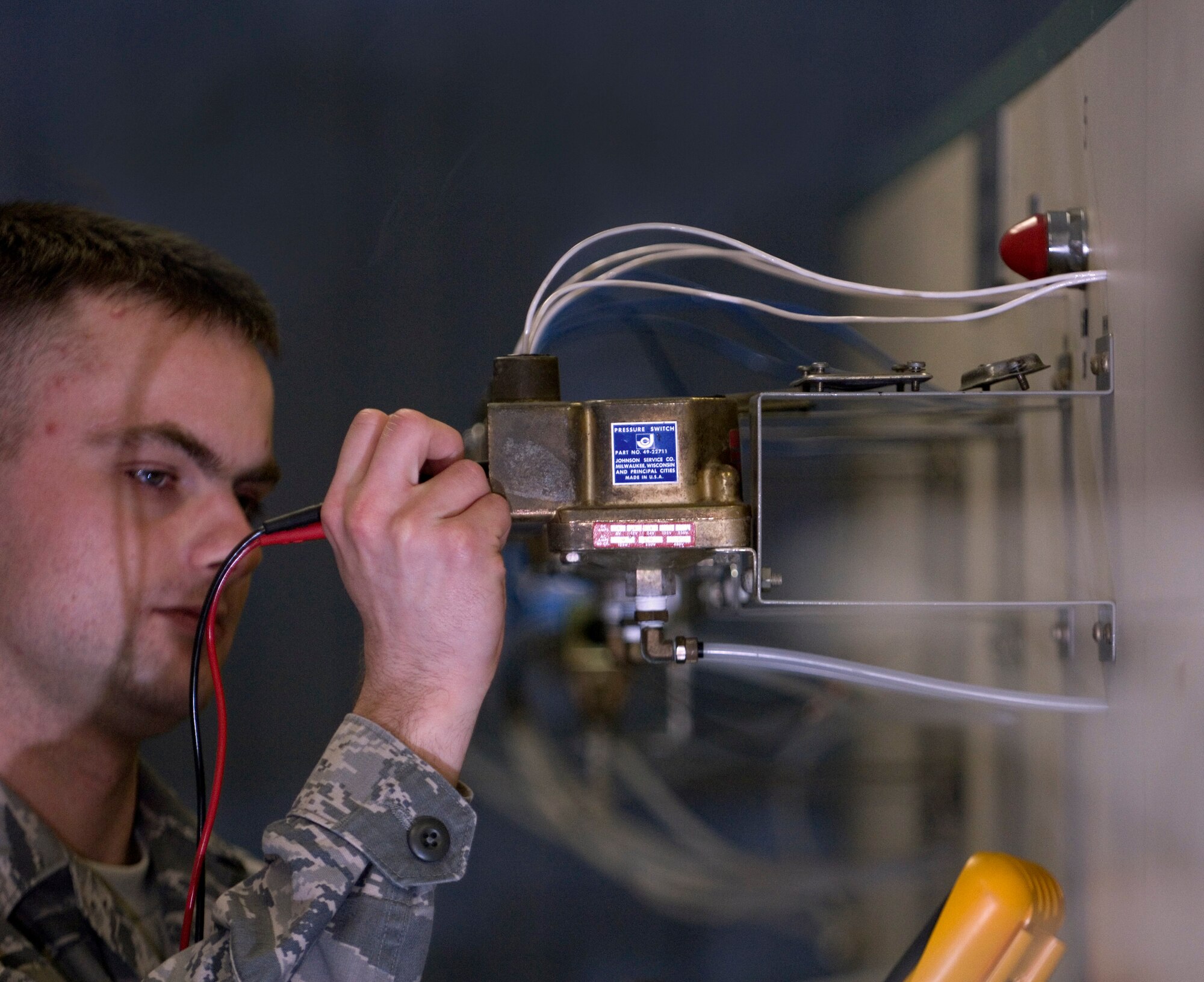 VANDENBERG AIR FORCE BASE, Calif. --  Airman 1st Class David Reynolds, a technical school student at the 532nd Training Squadron here, conducts hands-on
training for the environmental control system of a missile launch facility. (U.S. Air Force photo/Staff Sgt. Vanessa Valentine)