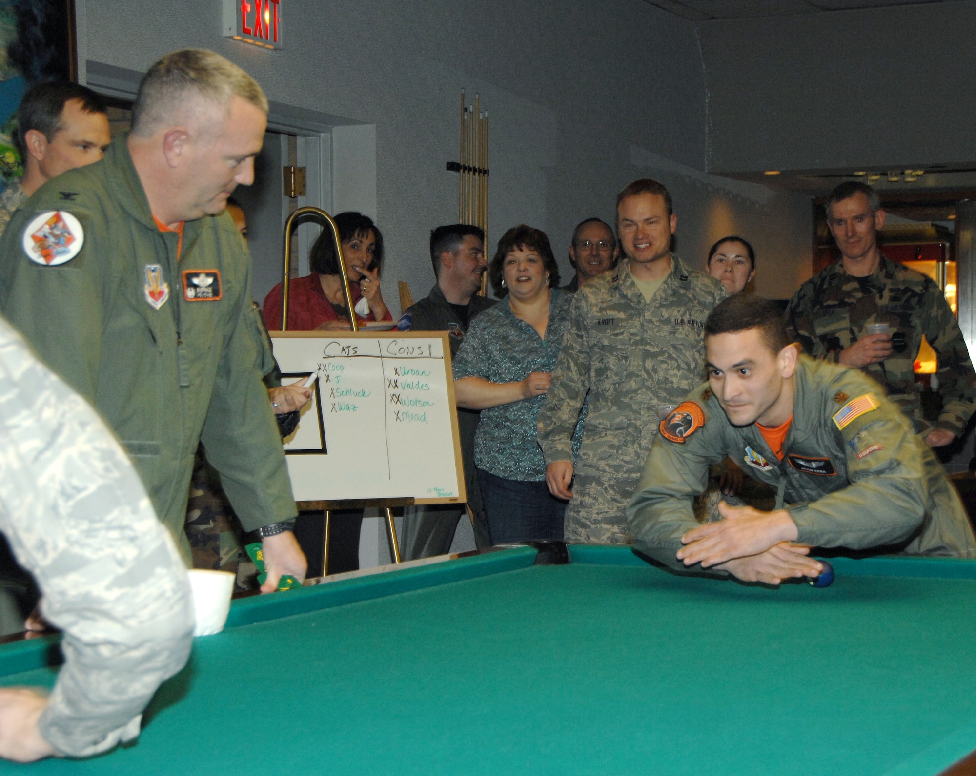 OFFUTT AIR FORCE BASE, Neb. -- Maj. Jason Riera, Assistant Director of Operations, 55th Combat Training Squadron, plays a game of "Crud" during a tournament at the Patriot Club Feb.  6. The tournament winners were Col. Thomas Goffus, 55th Mission Support Group commander, Lt. Col. Mitchell Maddox, 55th Mission Support Group deputy commander, Lt. Col. John Jacobson, 55th Contracting Squadron commander and Capt. Stephen Kroft, 55th Mission Support Group executive officer.  

U.S. Air Force Photo by Dana P. Heard
