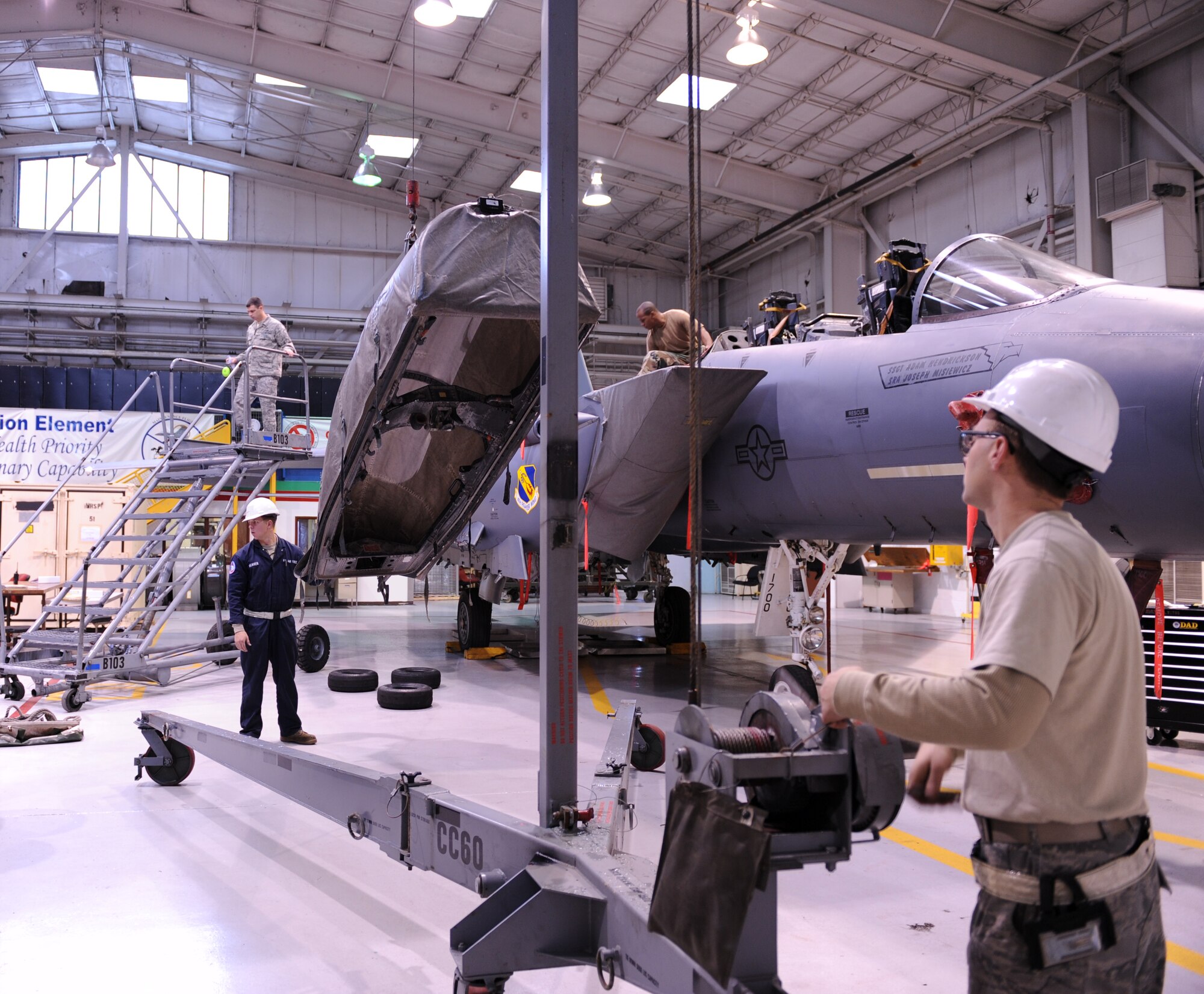 Members of the 4 equipment maintenance squadron work on an F-15E Strike Eagle during a phase inspection Jan 7, 2009 on Seymour Johnson Air Force Base, North Carolina. (U.S. Air Force photo by Airman 1st Class Gino Reyes)
