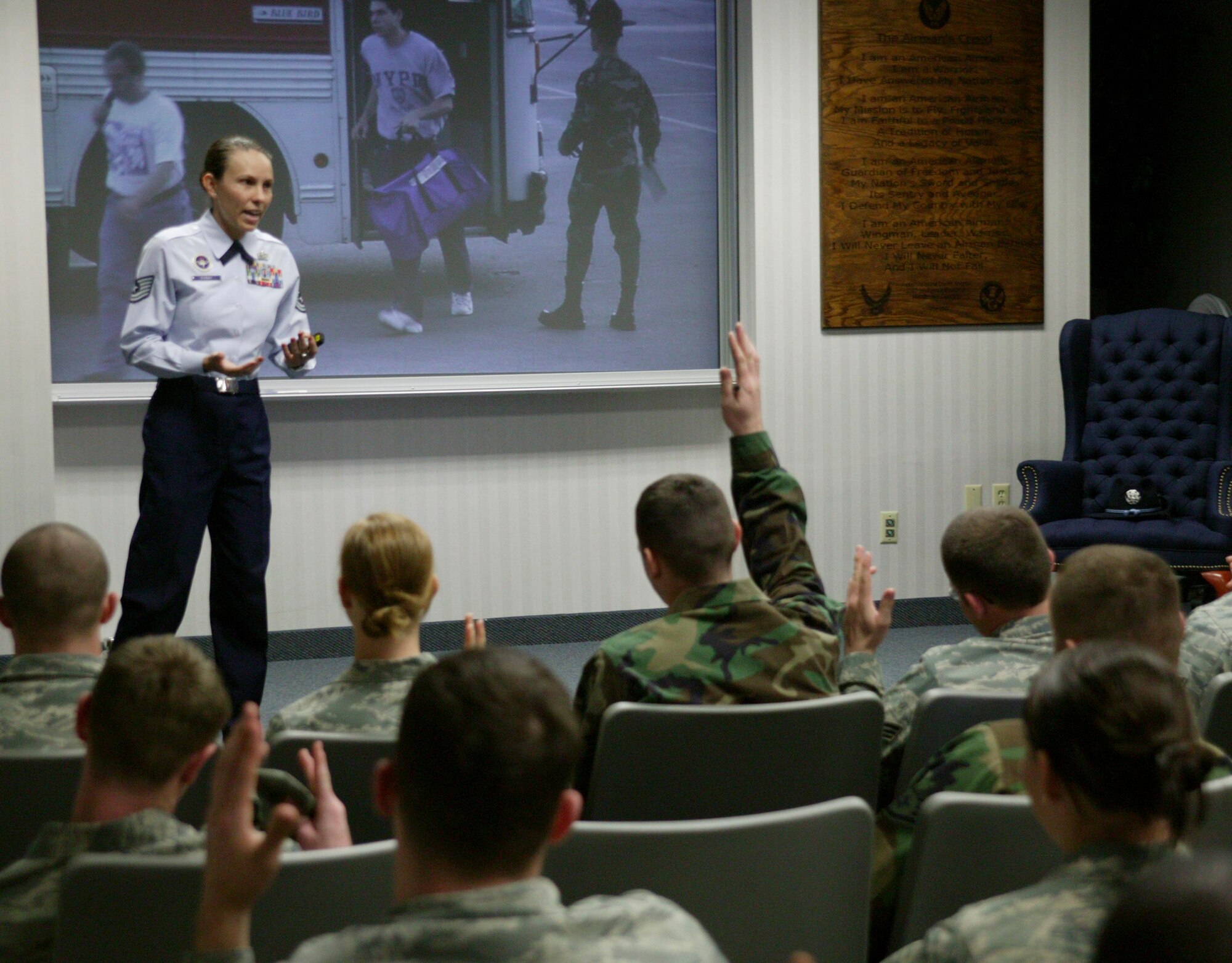 SHAW AIR FORCE BASE, S.C.-- Tech. Sgt. Danica Eusay, a Basic Military Training instructor on the MTI Recruiting Team, briefed more than 50 Shaw Airmen and answered questions about life as an MTI in the Airman Leadership School auditorium Feb. 10. (U.S. Air Force photo/Staff Sgt. Holly Brown)
