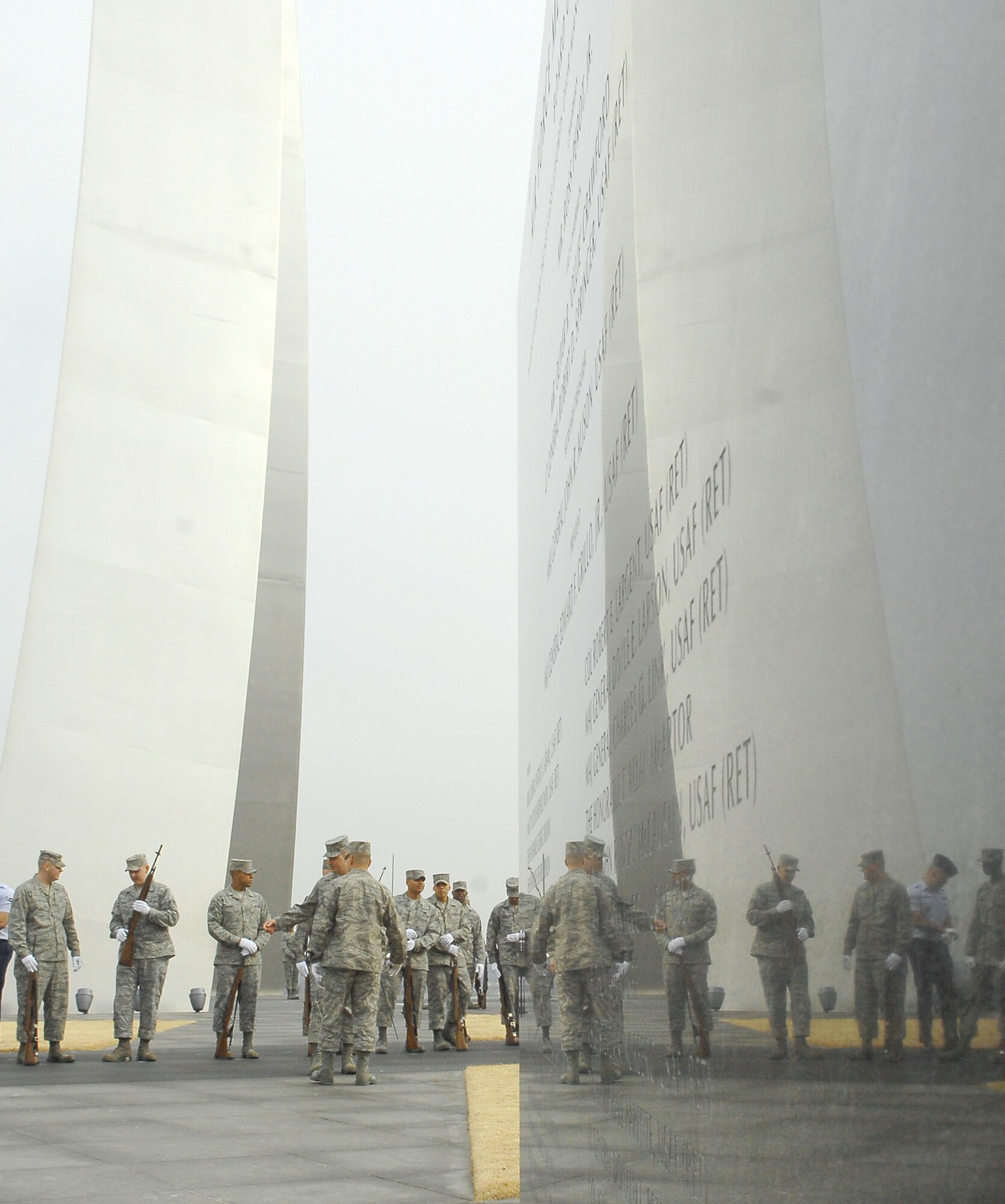 United States Air Force Honor Guard Airmen prepare for a practice run while training Feb. 10 at the National Air Force Memorial. More than 90 ceremonial guardsmen participated in the practice of the arrival and wreath laying ceremonies that will take place at the memorial through the year. The ceremonies are attended by senior military leaders from all over the world. (U.S Air Force photo by Senior Airman Alexandre Montes)