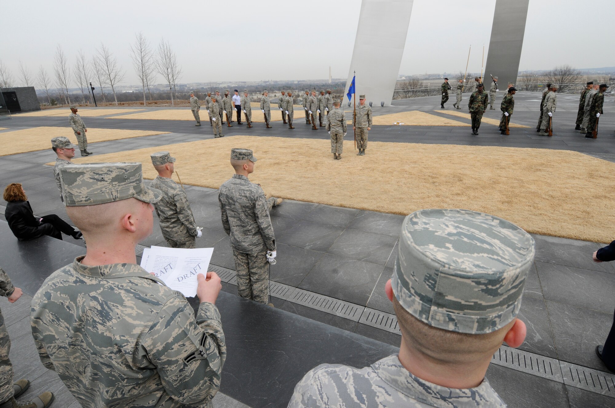 More than 90 United States Air Force Honor Guardsmen practice for arrival and wreath laying ceremonies at the National Air Force Memorial.  These ceremonies are held throughout the year and are attended by senior military leaders from all over the world. (U.S. Air Force photo by Staff Sgt. Dan DeCook) 