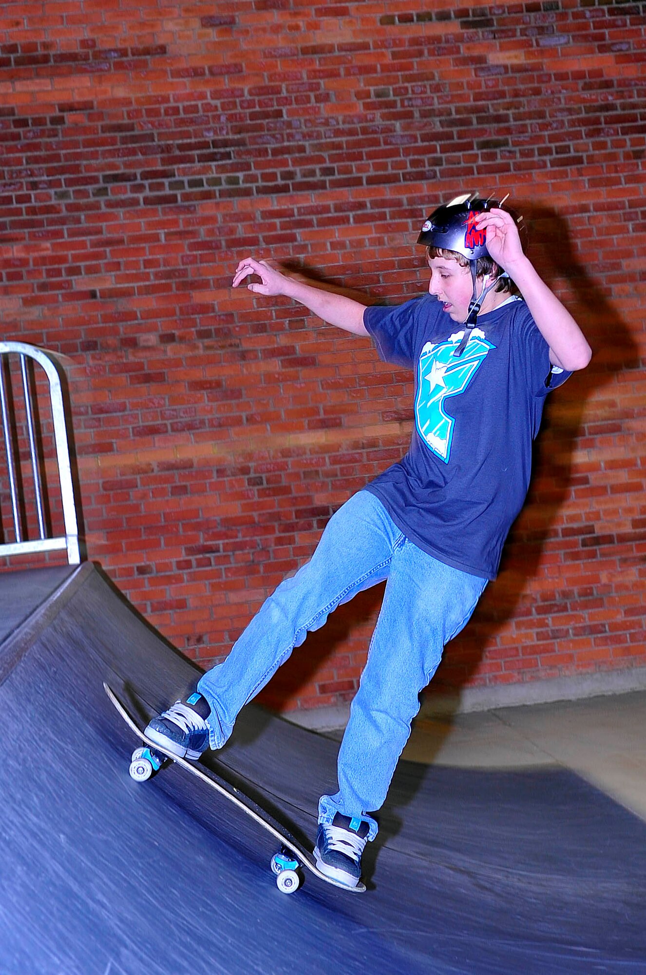 Jacob Nowlin skates up the ramp at the FunSpot’s newly opened skate park. (U.S. Air Force photo / Staff Sgt. JT May III)

