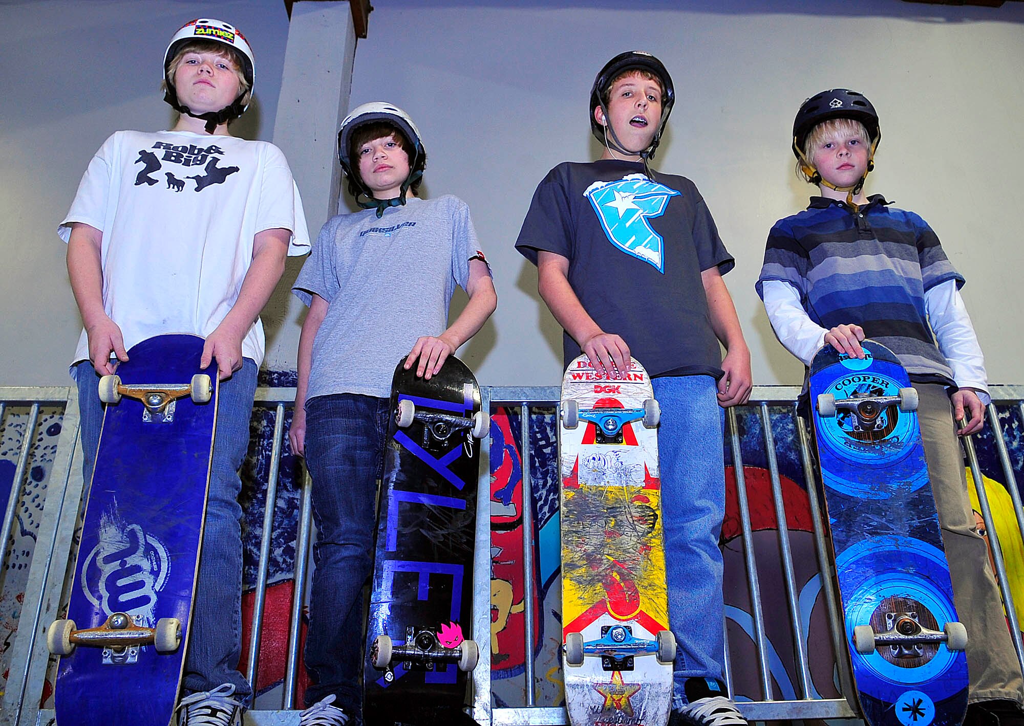 FAIRCHILD AIR FORCE BASE, Wash. – Left to right, Nick and Tyler Hilzendeger, Jacob Nowlin and Tom Holt pose for a photo during the ribbon cutting ceremony at the skate park. The event was held Feb. 10 at the FunSpot and marked the official grand opening. (U.S. Air Force photo / Staff Sgt. JT May III)