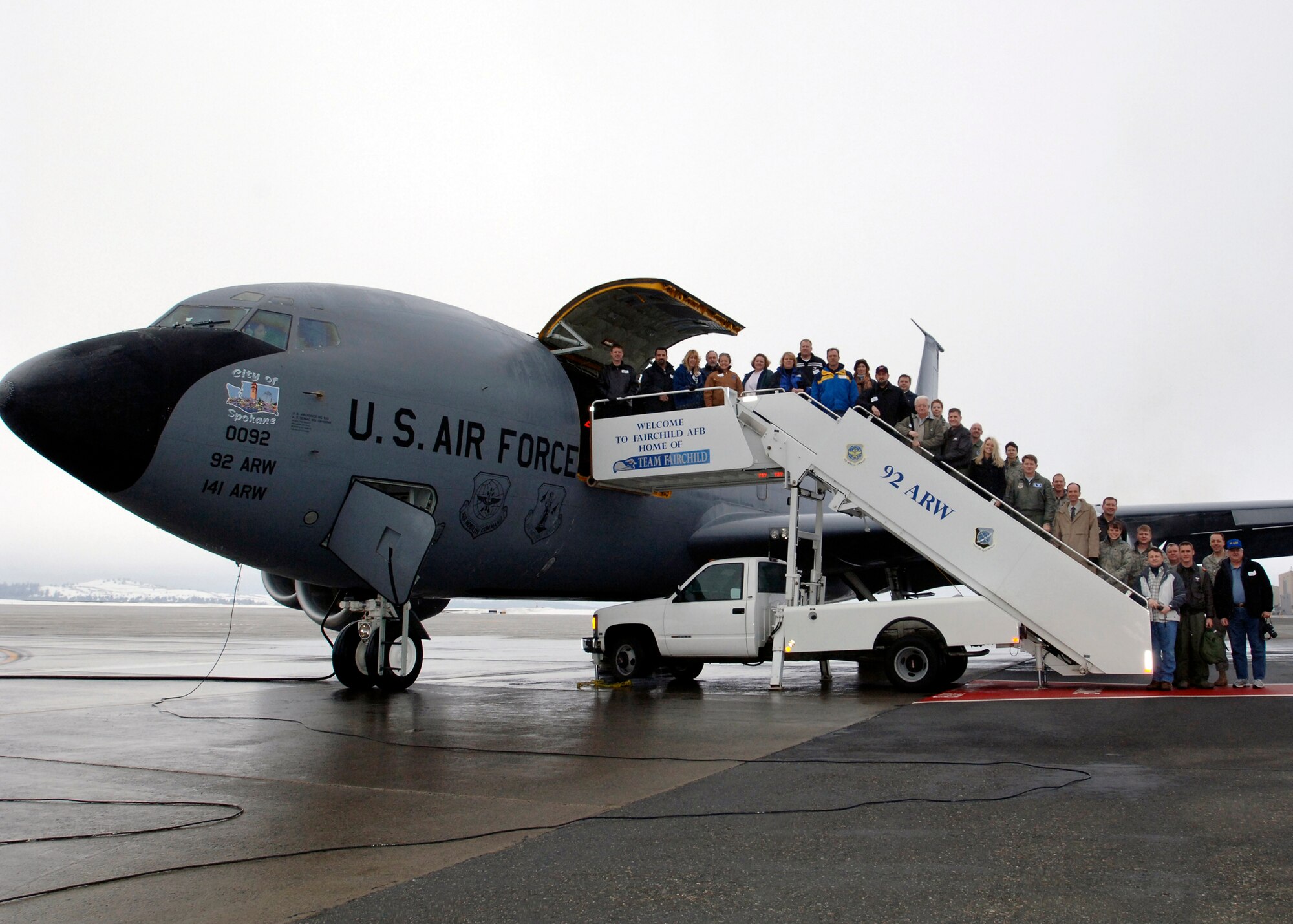 Honorary commanders pose with Fairchild commanders before a three- hour flight on a KC-135 Stratotanker, Feb. 10. The Honorary Commanders program pairs Spokane Civic Leaders with personnel at Fairchild to form a bond and familiarize the community with Fairchild operations. Honorary Commanders have access to most of the facilities on base including the Fitness Center, Outdoor Recreation, Fun Spot and base pool. (U.S. Air Force photo / Airman 1st Class Melissa L. Barnett)