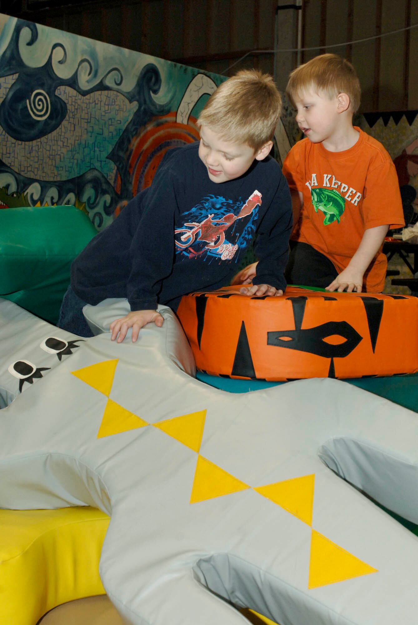 Jace, 6, and Parker, 4, take part in the activities at the FunSpot during Operation Home Front Feb 7. Operation Home Front is a program started to help families dealing with deployment. “We are here for you,” said Tech. Sgt. Sonyetta Charlton-Bell, 92nd Force Support Squadron, Airman and Family Readiness Center. “We want the families to know they are not alone.” (U.S. Air Force photo / Airman 1st Class Darlene West)