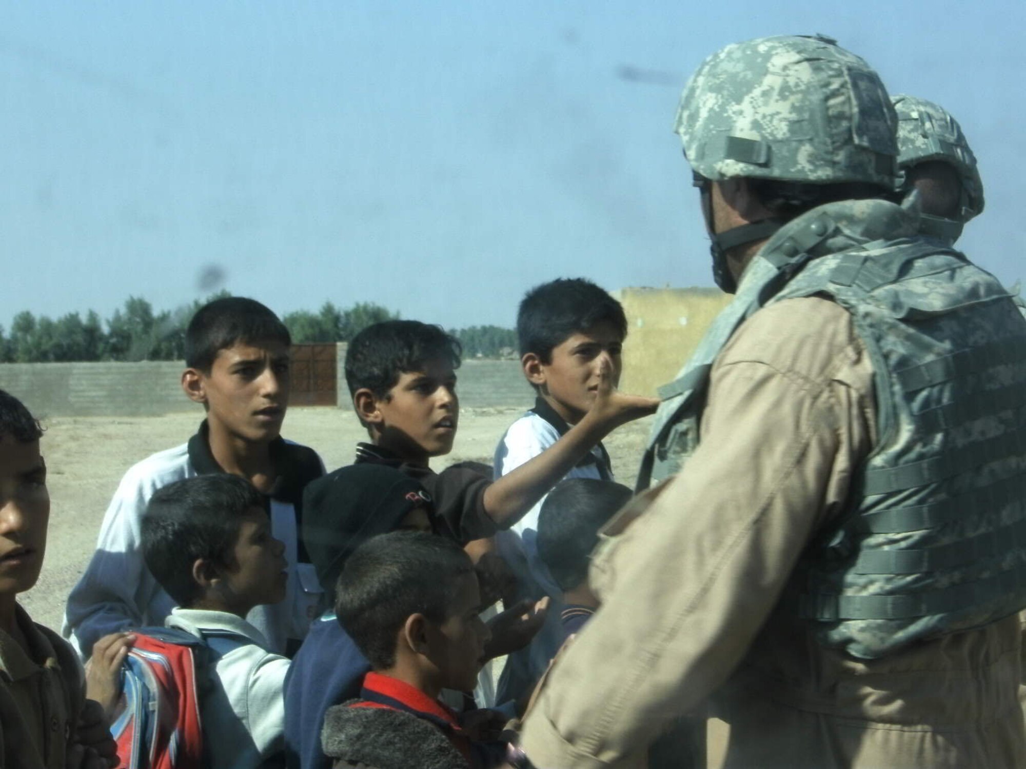 Members of Malmstrom's 341st and 741st Missile Security Forces Squadron routinely brought goodwill items to Iraqi children while conducting combat missions outside the wire during their deployment to Camp Bucca. (U.S. Air Force courtesy photo)