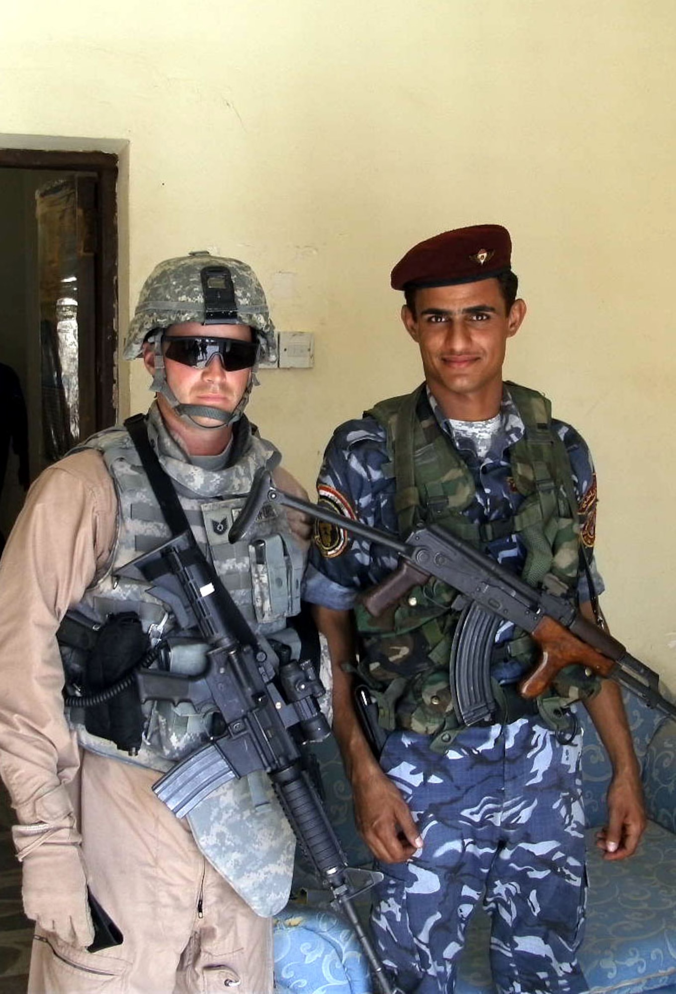 Tech. Sgt. Benjamin Rushford and a member of the Iraqi Defense Force prepare to attend a security council meeting in Safwan City. (U.S. Air Force courtesy photo)