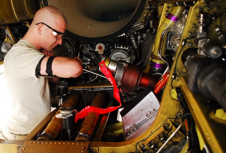Senior Airman Stephan Hooper, 56th Component Maintenance Squadron fuel system technician, tightens the bolts on an engine fuel strainer assembly Feb. 9 at the fuels system maintenance back shop. The F-16 Fighting Falcon’s fuel system incorporates many fuels strainers and filters to ensure clean fuel to the engine. (Photo by Air Force Staff Sgt. Phillip Butterfield)