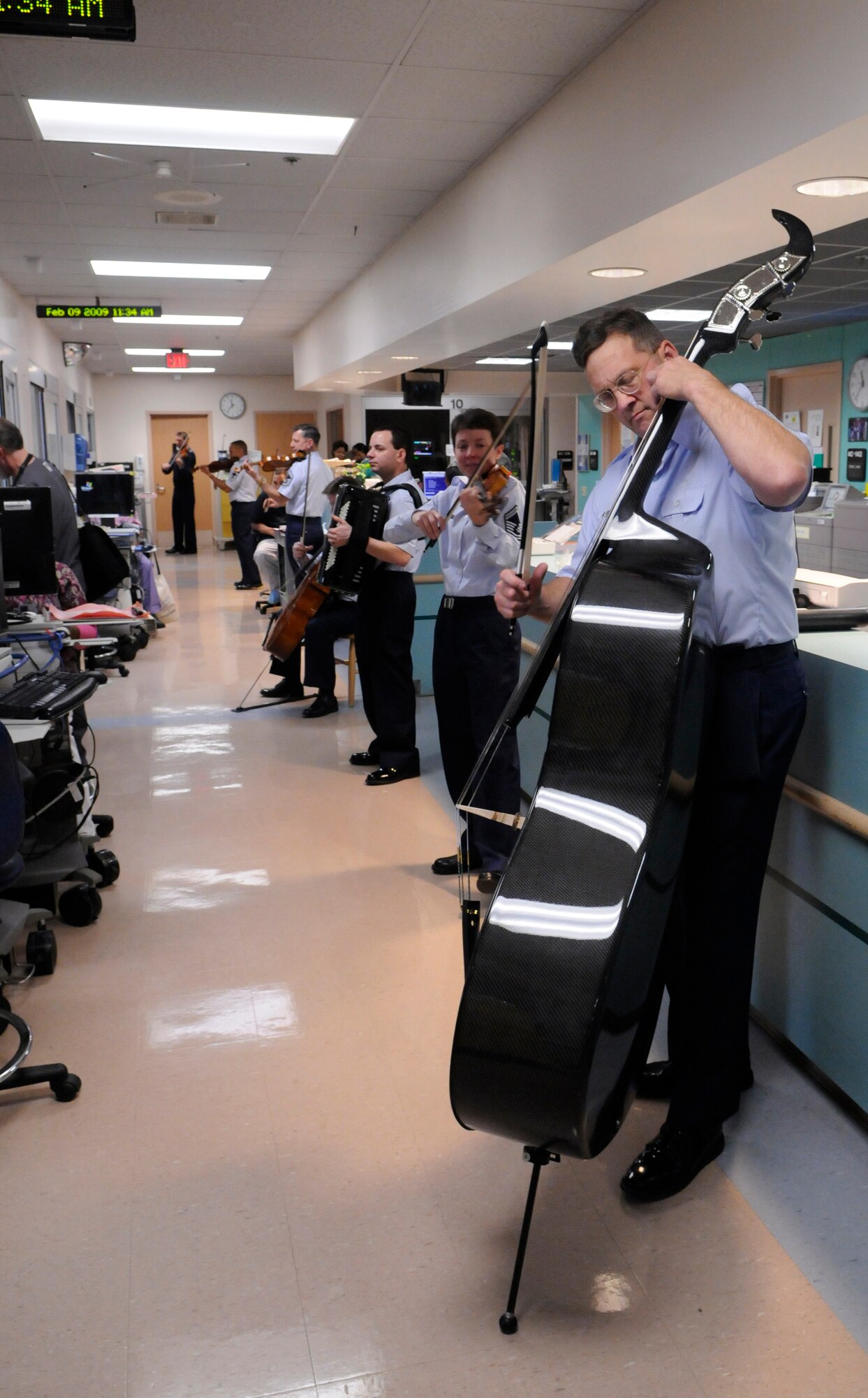The United States Air Force Band’s Strolling Strings performs for patients and staff members Feb. 9 at the Baltimore Veterans Affairs Medical Center. In addition to the Band, More than 35 Bolling and Pentagon Airmen visited the hospital to spend time with the patients, and hand out T-shirts and Valentine’s Day cards. (U.S. Air Force photo by Senior Airman Tim Chacon)