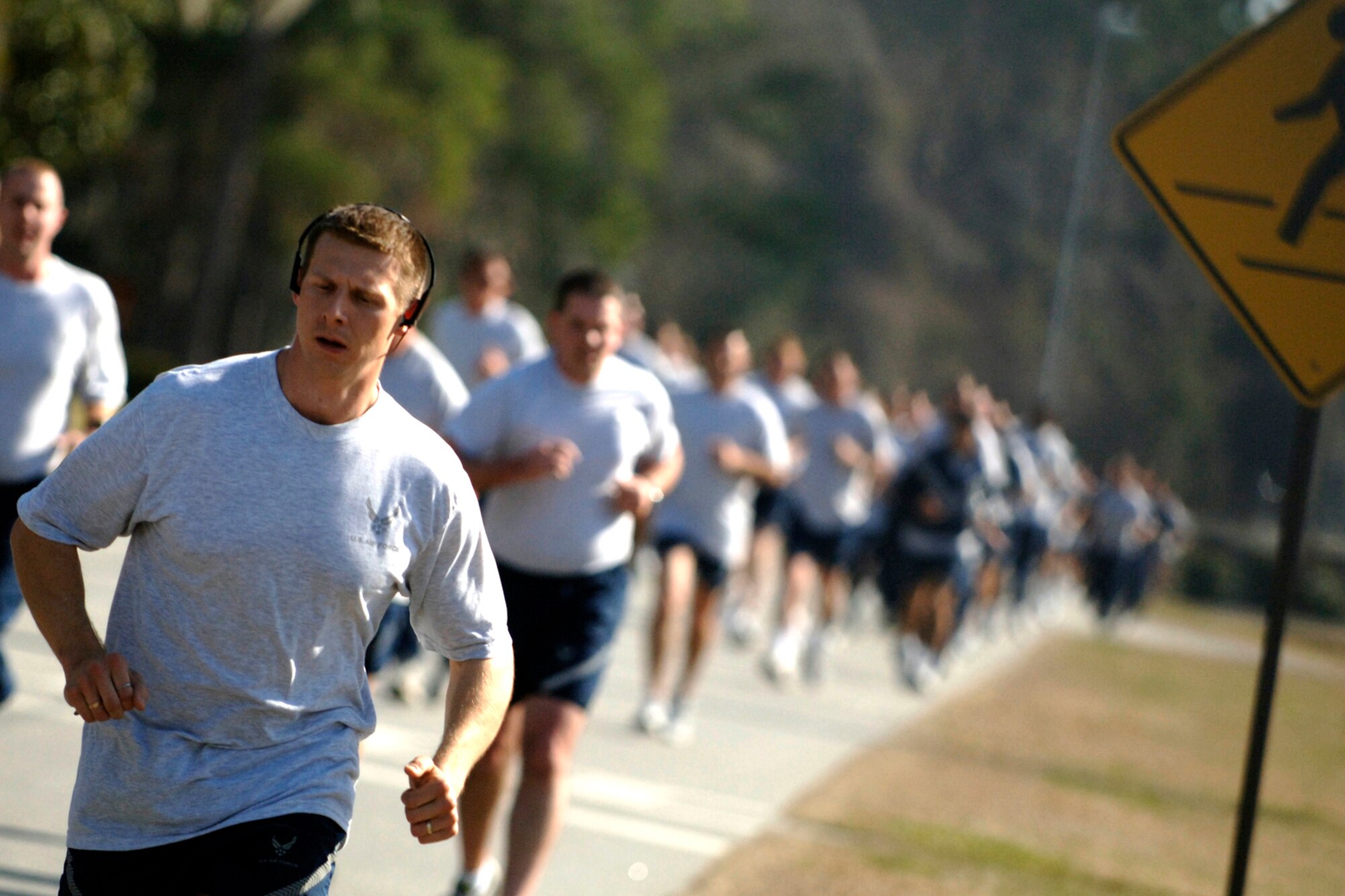 Team Charleston Airmen pace themselves as they near the three-quarter mark of the 5,000-meter run Commander's Fitness Challenge on Charleston AFB Feb. 6. More than 400 Airmen from various squadrons came out to participate in the monthly challenge. (U.S. Air Force photo/Senior Airman Timothy Taylor)