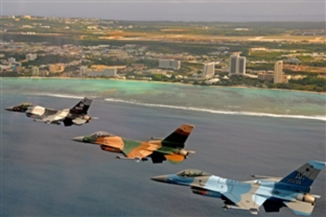 A trio of F-16 Fighting Falcons assigned to the18th Aggressor Squadron at Eielson Air Force Base, Alaska, fly in formation over Tumon Bay, Guam, during exercise Cope North 09-1, Feb. 10, 2009. Units from the U.S. Air Force, U.S. Navy and the Japan Air Self Defense Force participated in the joint bilateral exercise on Andersen Air Force Base, Guam.