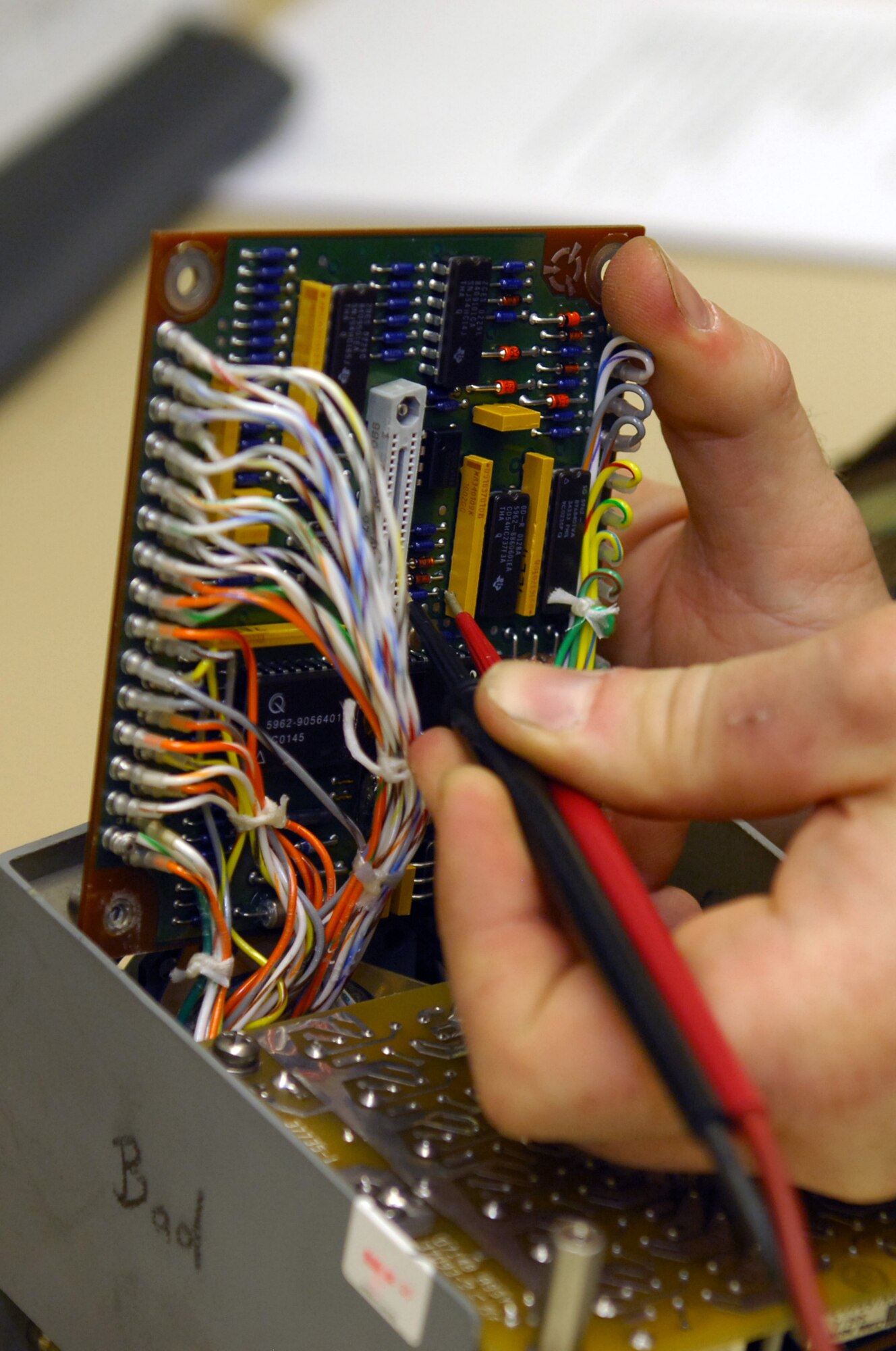 Tech. Sgt. David Decker, Air Force Repair Enhancement Program technician, performs a continuity check on a communications panel Feb. 6. A continuity check is used for troubleshooting by checking for resistance of electrical circuits.
(U.S. Air Force photo by Staff Sgt. Erin T. Worley)