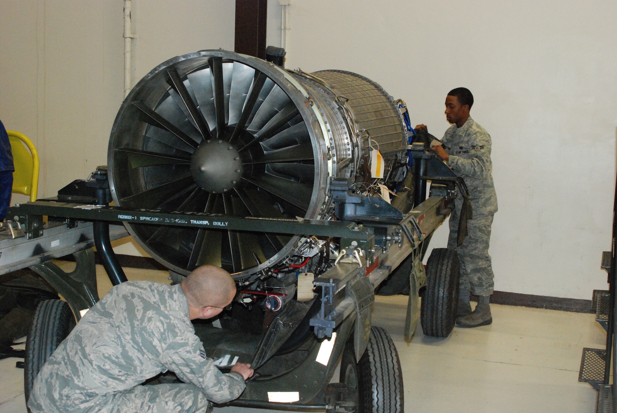 Members of the 9th Maintenance Squadron's Propulsion Flight prepare to cover a U-2 engine Feb. 11, before it is shipped to Kadena Air Base, Japan. The flight is accountable for all U-2 and Global Hawk engines around the world. (Photo by Airman 1st Class Chuck Broadway)