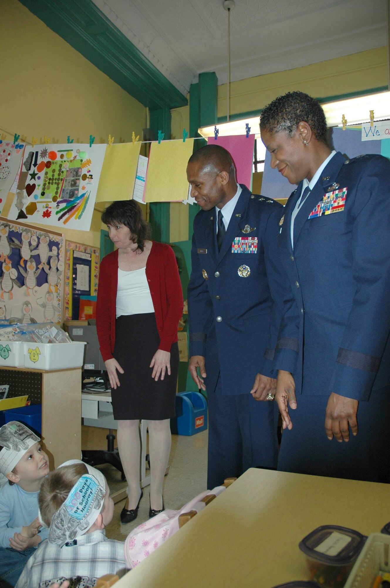 Maj. Gen. Darren W. McDew and Brig. Gen. Allyson Solomon visited the students of Public School 34, Brooklyn, NY, during the school's Citizenship Day Feb. 11. Both Generals McDew and Solomon were guest speakers for the school's event, where they spoke about what exemplifies a great citizen. General McDew is the director of Public Affairs, Office of the Secretary of the Air Force. General Solomon is the assistant adjutant general for the Maryland Air National Guard and special assistant to the National Guard Bureau chief. (U.S. Air Force photo/Capt. Geoff Buteau) 
