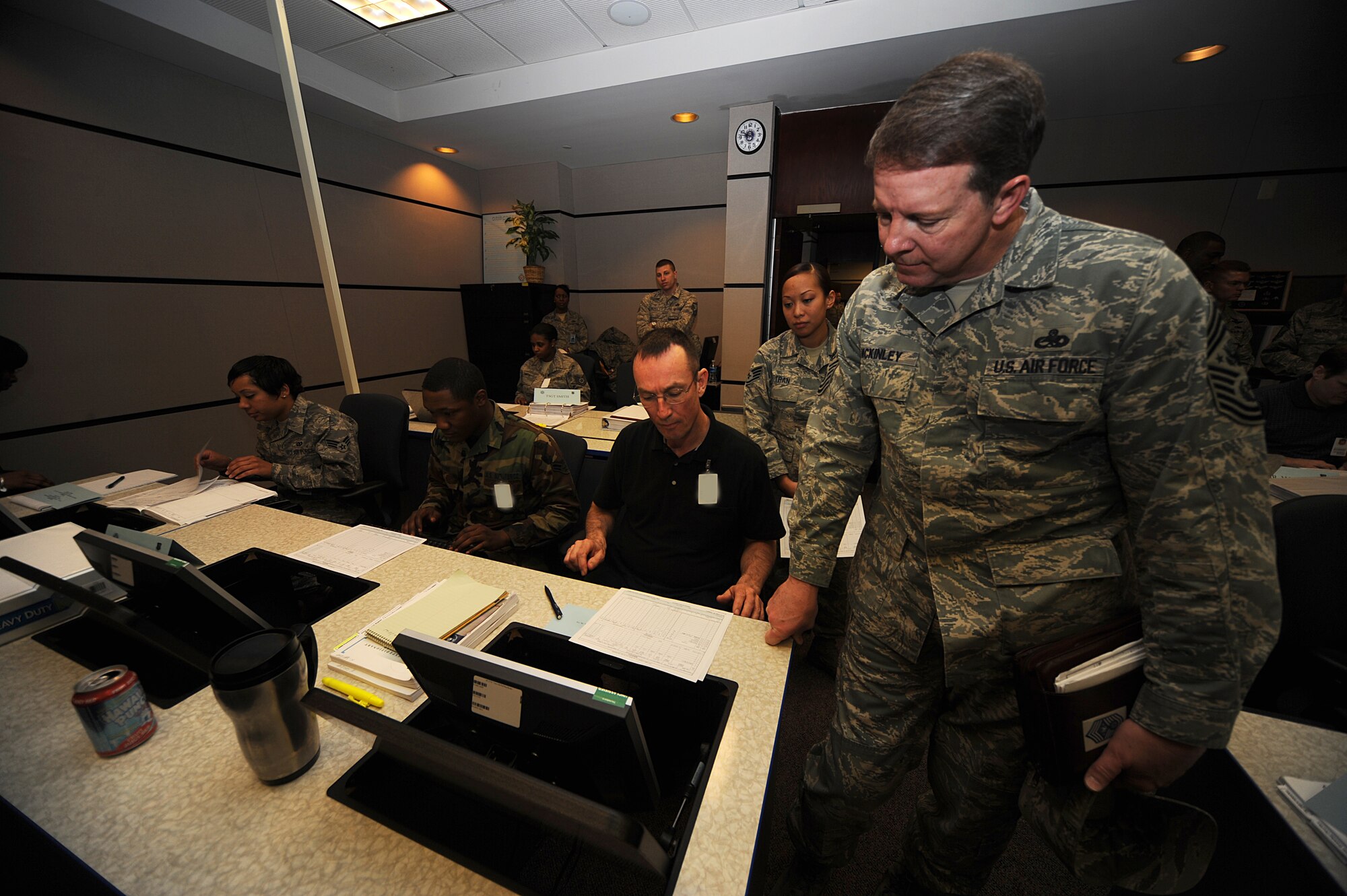 Chief Master Sgt. of the Air Force Rodney McKinley observes Aviation Resource Management Course students in training on Feb. 10, 2009, in a U.S. Air Force Expeditionary Center classroom on Fort Dix, N.J.  Chief McKinley visited McGuire and the Expeditionary Center to learn more about expeditionary training and operations in both areas. The ARM Course is taught by the Mobility Operations School.  (U.S. Air Force Photo/Staff Sgt. Nathan Bevier)