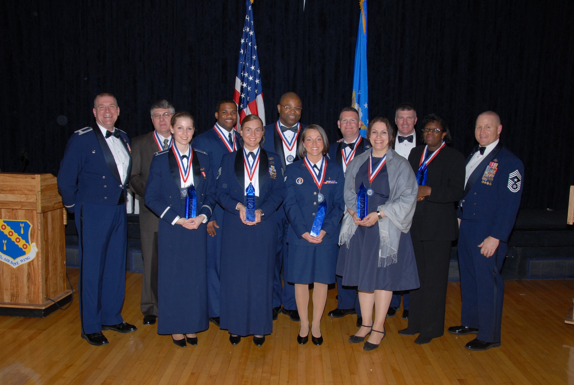 At the annual awards banquet Feb. 6, the 42nd Air Base Wing honored it best for 2008. Nine military and civilian members of the Wing received trophies from Col. Kris D. Beasley, commander of 42nd ABW. Pictured are (back row from left) Colonel Beasley, Gary Looney, Senior Airman Brian Coleman, Senior Master Sgt. Richard Bullock, Senior Master Sgt. Paul Hughes, Chief Master Sgt. Mark Repp, (front from left) 1st Lt. Sommer Rangel, Tech. Sgt. Jennifer Laufer, Senior Airman Ashley  Lathan, Christine Bushby, Arleen Dearbone and Chief Master Sgt. (ret.) Benjamin Harper. (Air Force photo by Bud Hancock)