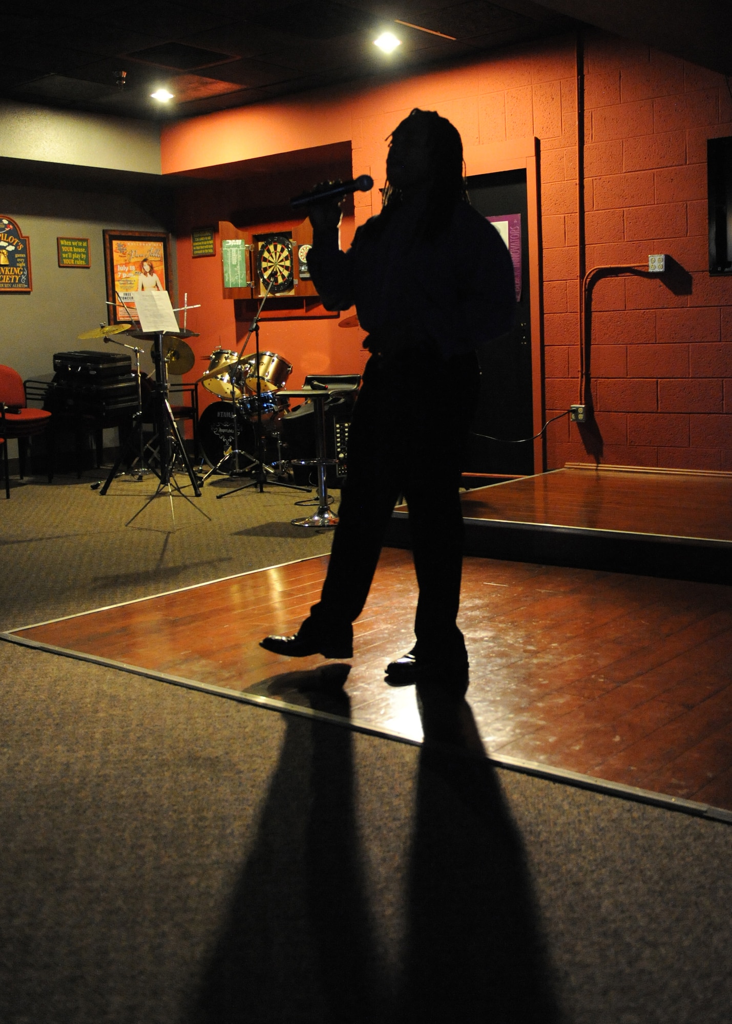 Mr. Skip Hoffman, 49 Logistics Readiness Squadron performs at the "Spoken Word 2009" presented by the African American Heritage Committee at Holloman Air Force Base, N.M., Feb. 9. The event featured some of Holloman's finest poets, dancers and singers. (U.S. Air Force photo/Senior Airman Michael Means)