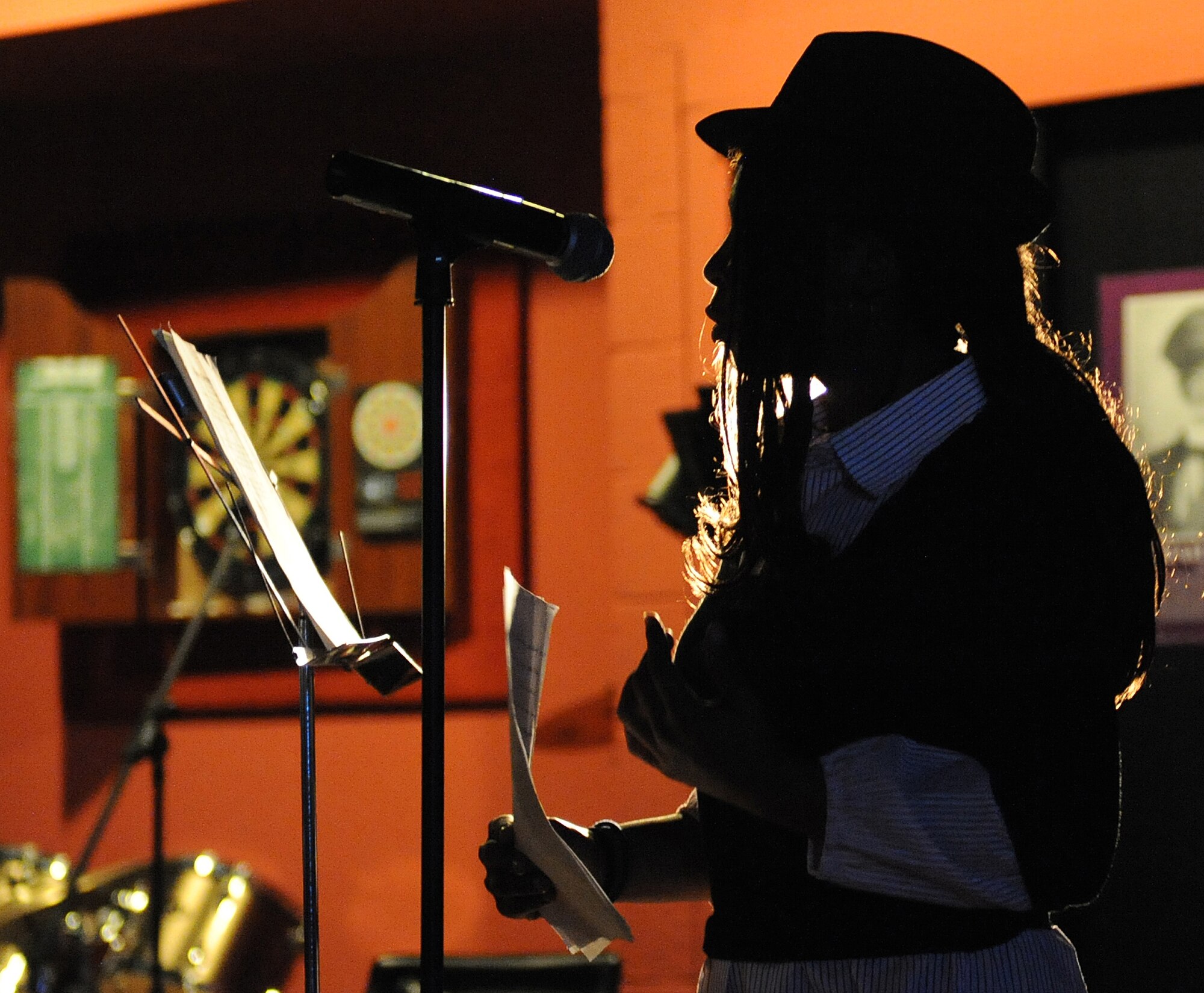 Damani Hoffman, daughter of retired Air Force Master Sgt. Dedra Hoffman, performs at the "Spoken Word 2009" presented by the African American Heritage Committee at Holloman Air Force Base, N.M., Feb. 9. The event featured some of Holloman's finest poets, dancers and singers. (U.S. Air Force photo/Senior Airman Michael Means). 