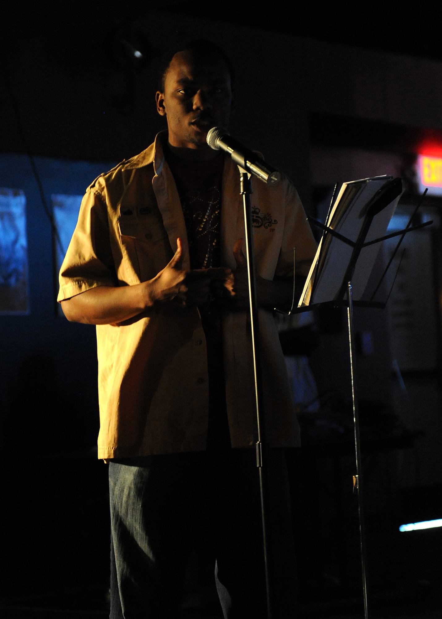 Senior Airman Jamel James,49th Mission Support Group performs at the "Spoken Word 2009" presented by the African American Heritage Committee at Holloman Air Force Base, N.M., Feb. 9. The event featured some of Holloman's finest poets, dancers and singers. (U.S. Air Force photo/Senior Airman Michael Means)