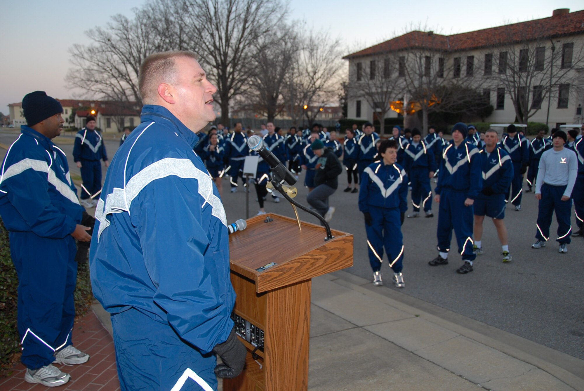 Col. Kris D. Beasley, commander of the 42nd Air Base Wing, greets wing members as they prepare for the Jan. 30 fun run. The run began and ended at the “prop and wings” monument in front of building 800. Temperatures were as low as 26 degrees as the runners began their 5K journey through the base. (Air Force photo by Jamie Pitcher)