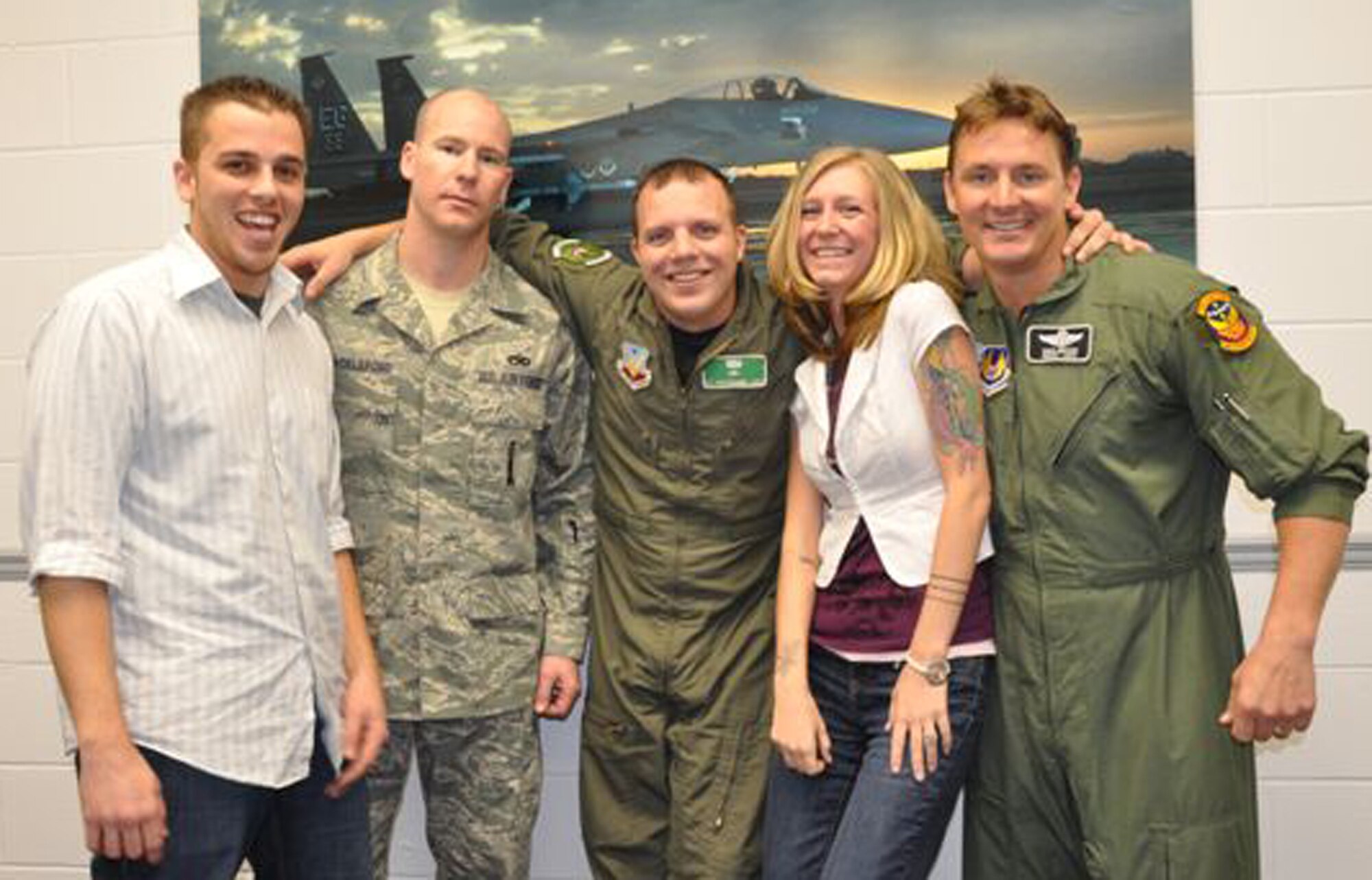 Members of Team Eglin formed a band  - Clinch 46, and a friendship as well.  Band members (left to right), Dan Austin, (guitarist) 46th Test Wing, Tech Sgt. John Shackleford, (bass guitar), 372nd Training Squadron, Staff Sgt. Benjamin Rosciglione, (lead guitar) 372nd Training Squadron, April Lewis, (lead singer) 96 Medical Group, and Senior Master Sgt. Ross Matson, (drummer) 486th Flight Training Squadron.  (Courtesy photo.)