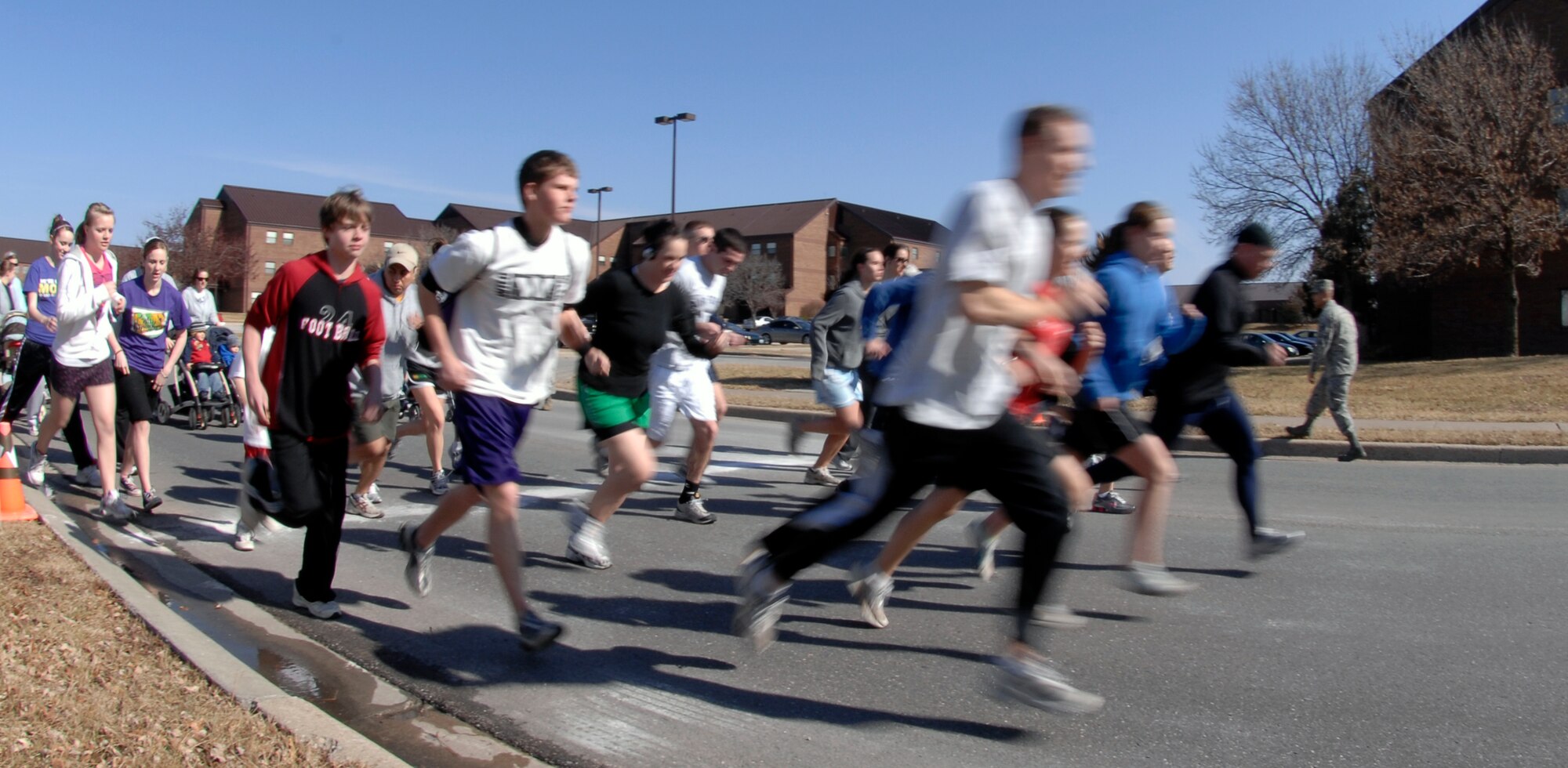WHITEMAN AIR FORCE BASE, Mo.  – More than 30 members of Team Whiteman take-off Feb. 12 from the starting line of the Healthy Heart 5K Fun Run. Active duty, Army National Guard, Air Force Reserve and dependants participated in the event. The winners of the run were Capt. Richard Reed, 509th Force Support Squadron, for males with a time of 19:54 and Megan Reed, daughter of Captain Reed, for females with a time of 21:43. The Whiteman Fitness Center holds several fun runs a year as part of the Air Force Fit-to-Fight program. (U.S. Air Force photo/Staff Sgt. Jason Barebo)