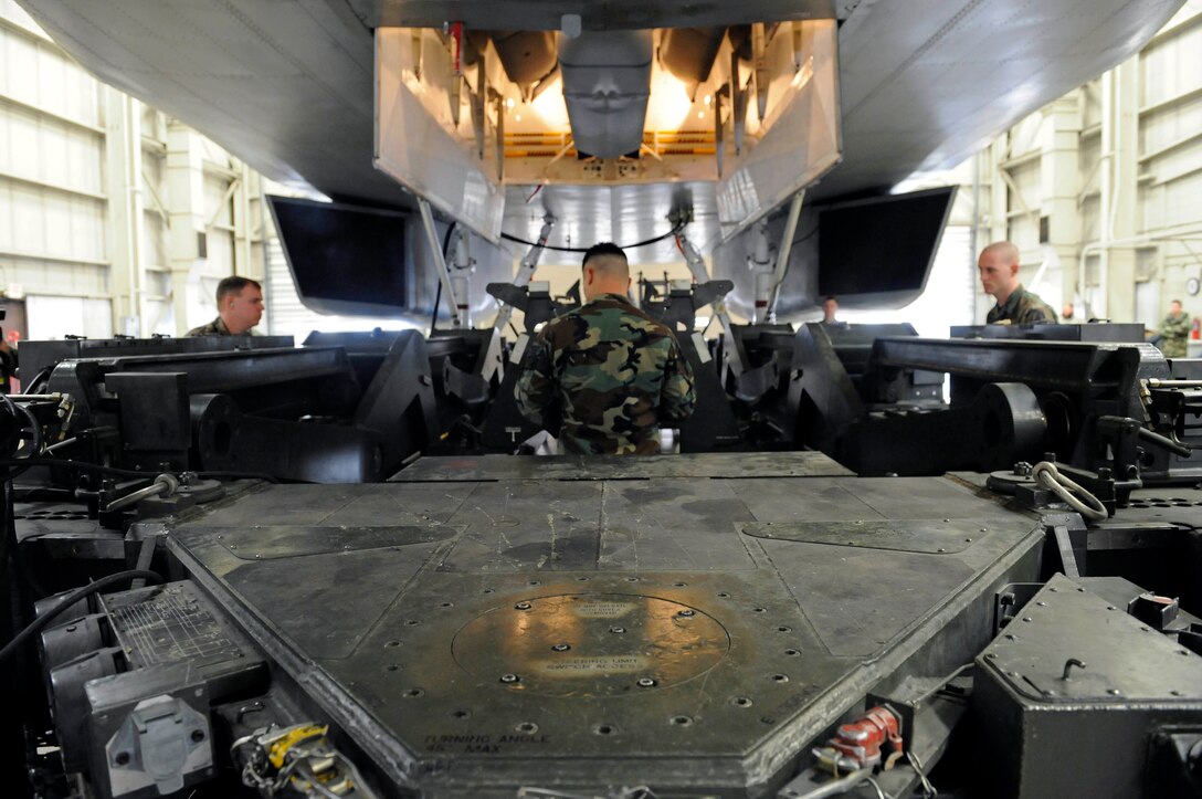 A team of load crew members from the 28th Aircraft Maintenance Squadron compete in the 2009 bomb load competition here, Feb. 12. The competition features the best load crews from five bomber bases and is scored and rated by evaluators from Eighth Air Force. (US Air Force photo/Airman 1st Class Corey Hook)