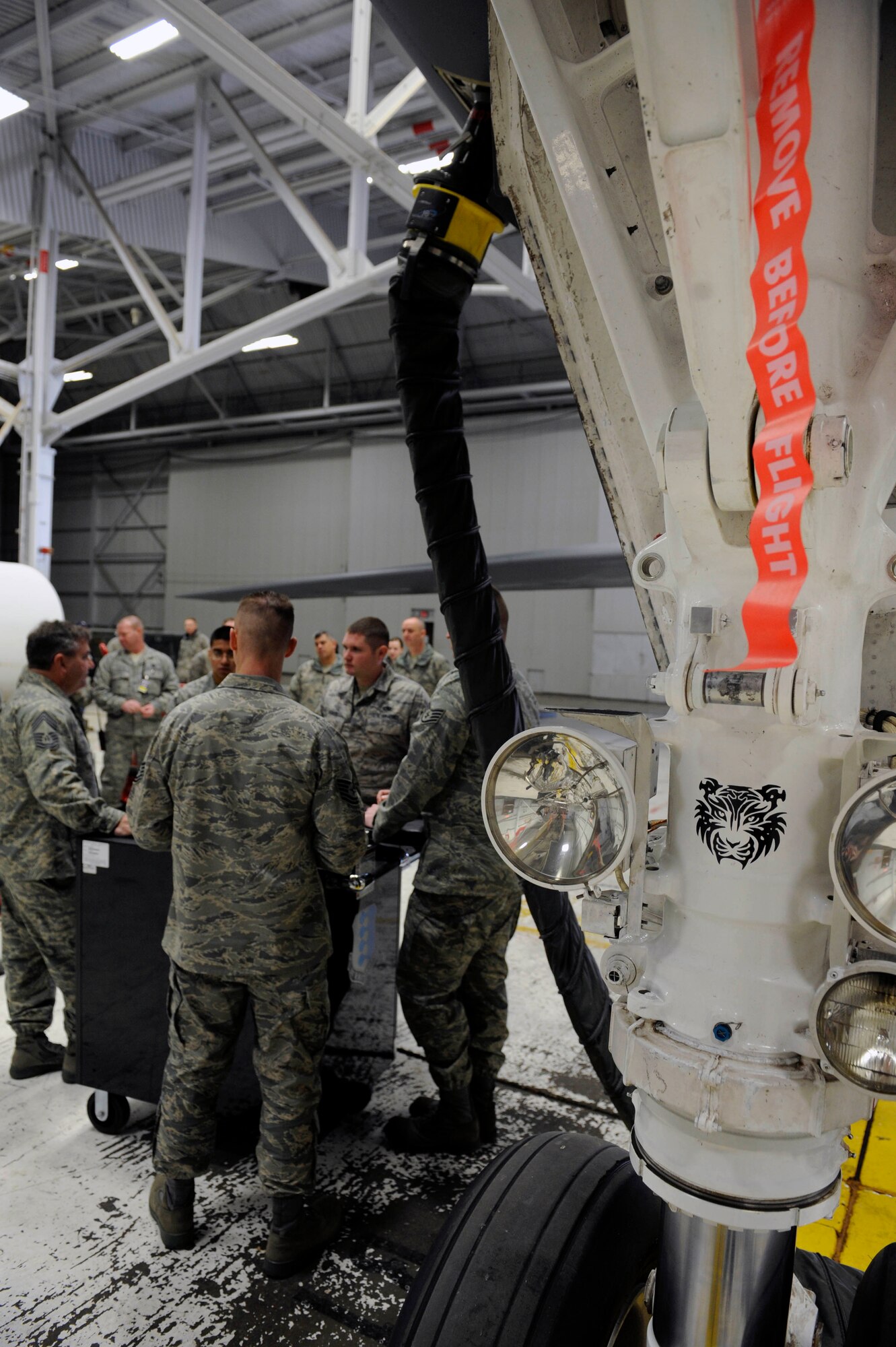 Inspectors from Eighth Air Force test two Ellsworth crew chiefs on their preflight inspection performance here, Feb. 12. Ellsworth, Barksdale AFB, La., Minot AFB, N.D., Whiteman AFB, Mo., and Dyess AFB, Texas, were all inspected by Eighth Air Force during the 2009 bomb load competition. (US Air Force photo/Airman 1st Class Corey Hook)